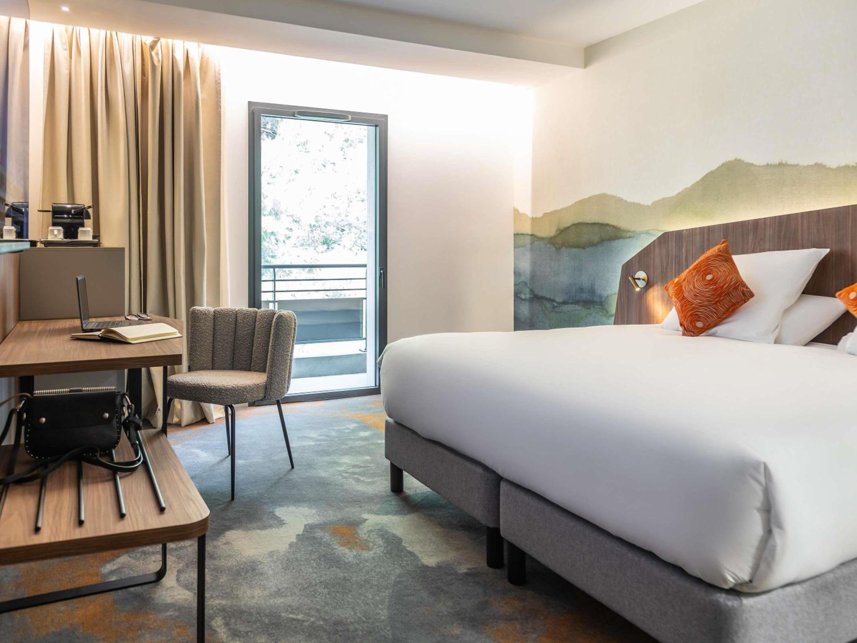 Privilege Room with One King Bed and One Sofa Bed with Balcony - Photo 1
