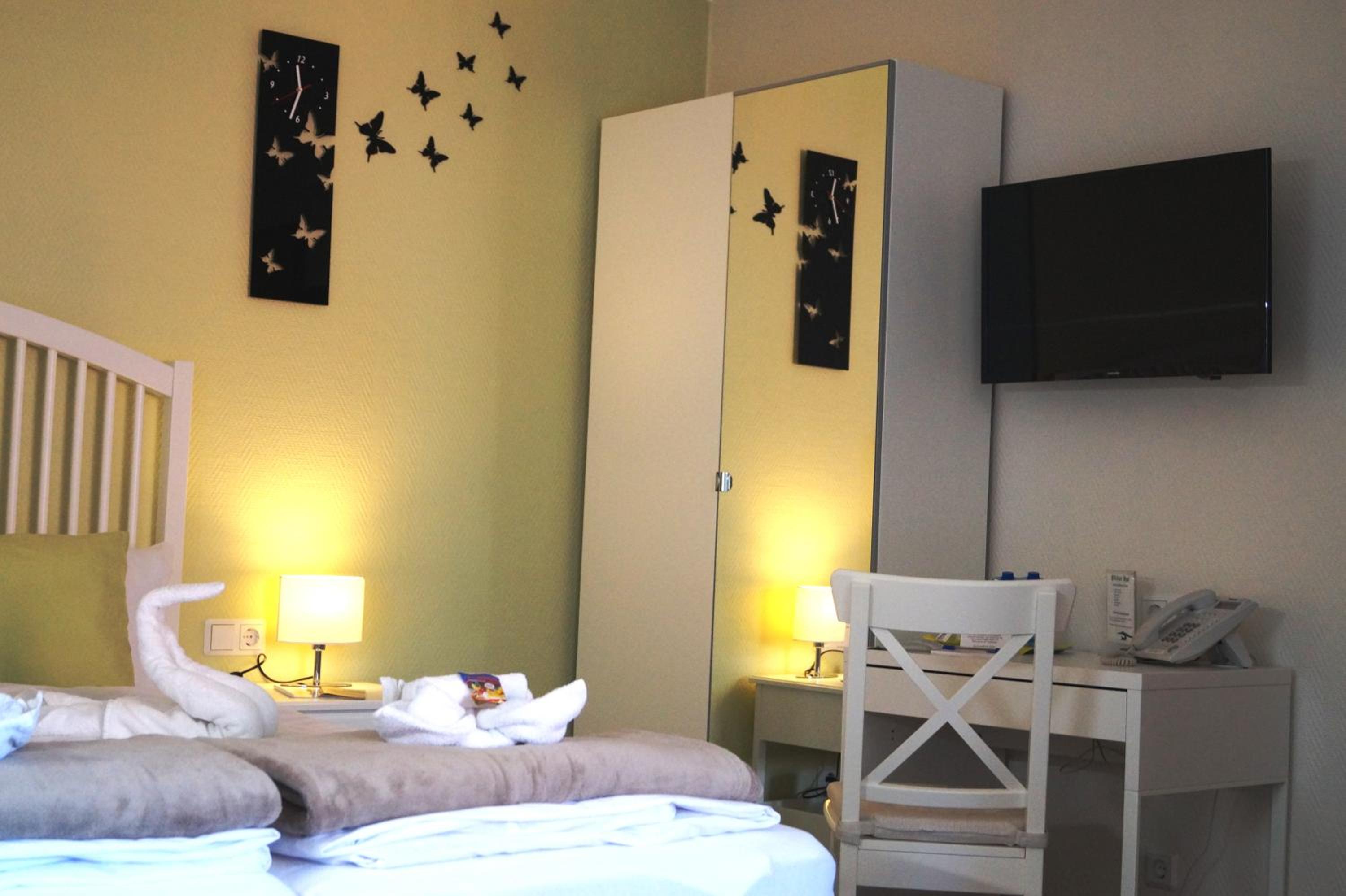 Triple Room (2 Adults)