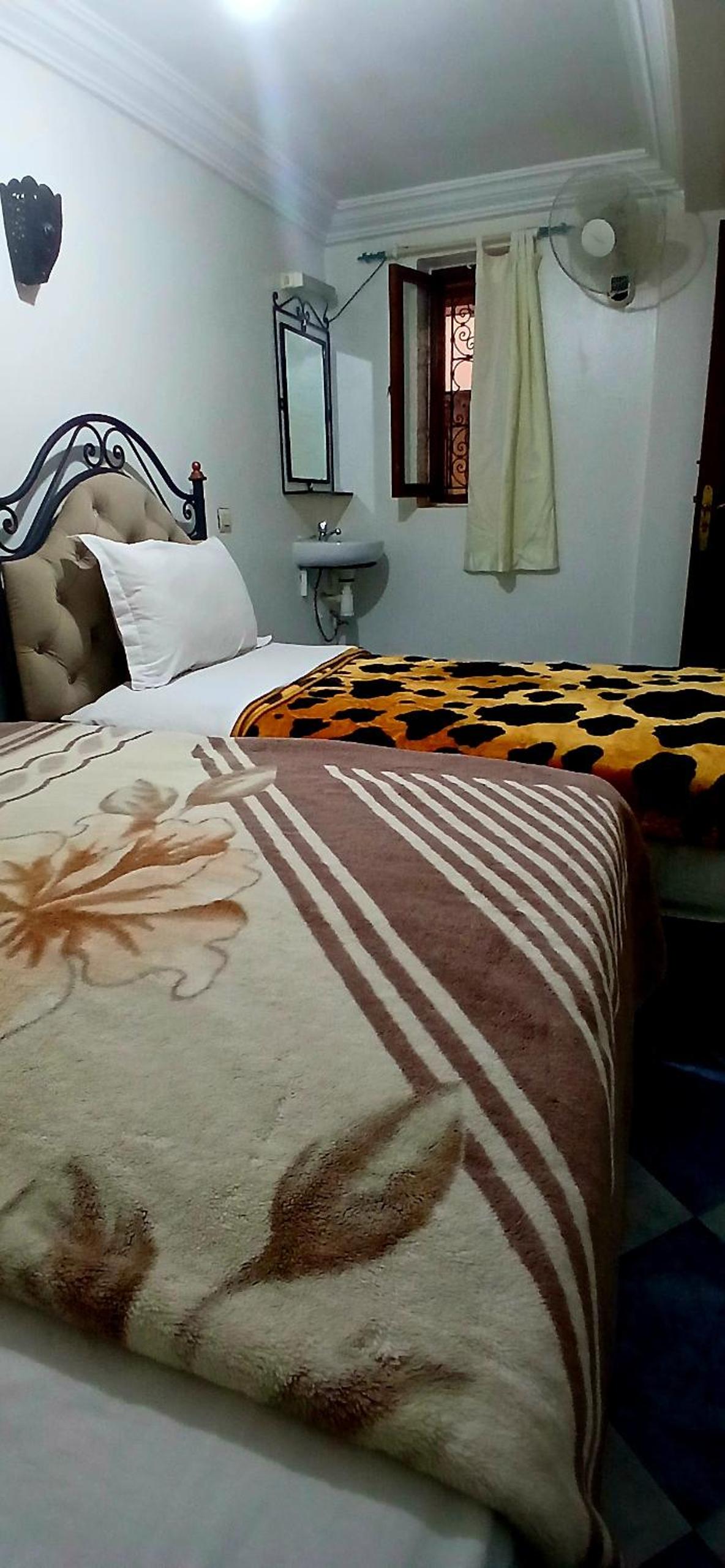 Economy Triple Room with Shared Bathroom