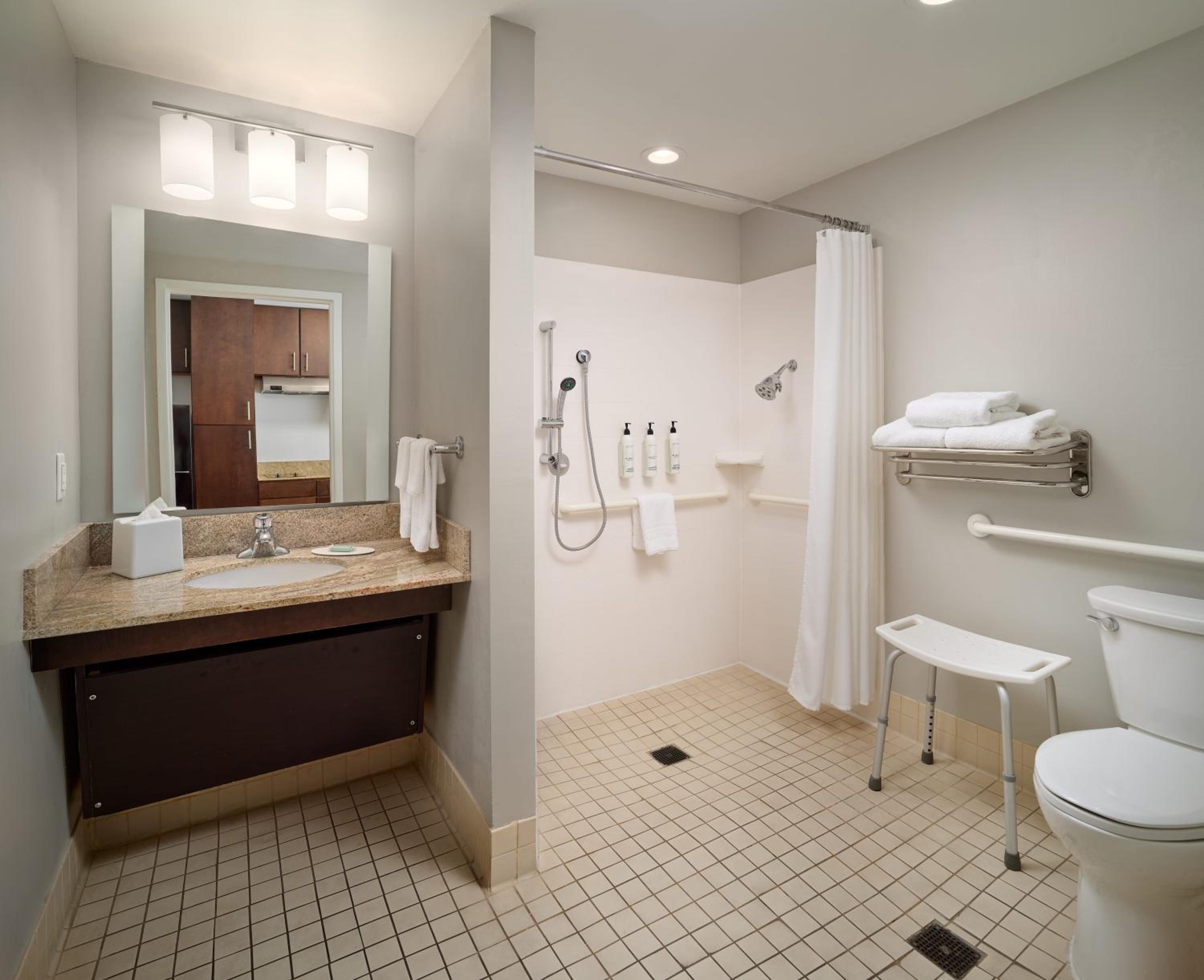 Studio King Suite with Sofa Bed - Mobility Access with Roll-In Shower
