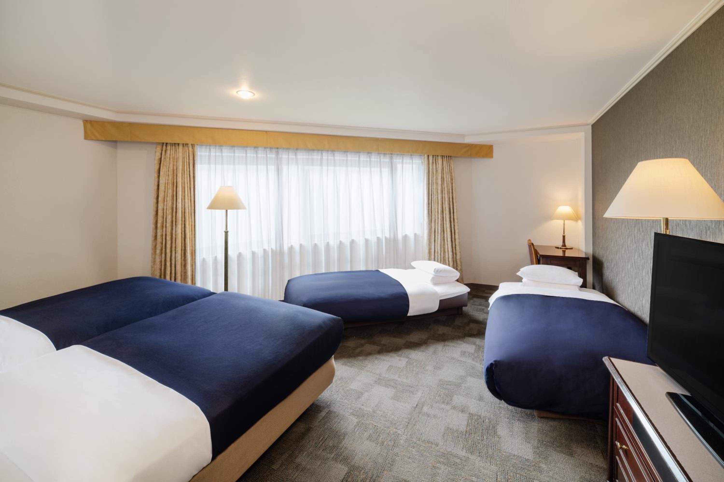 Deluxe Quadruple Room - Non-Smoking - House Keeping is Optional with Additional Cost