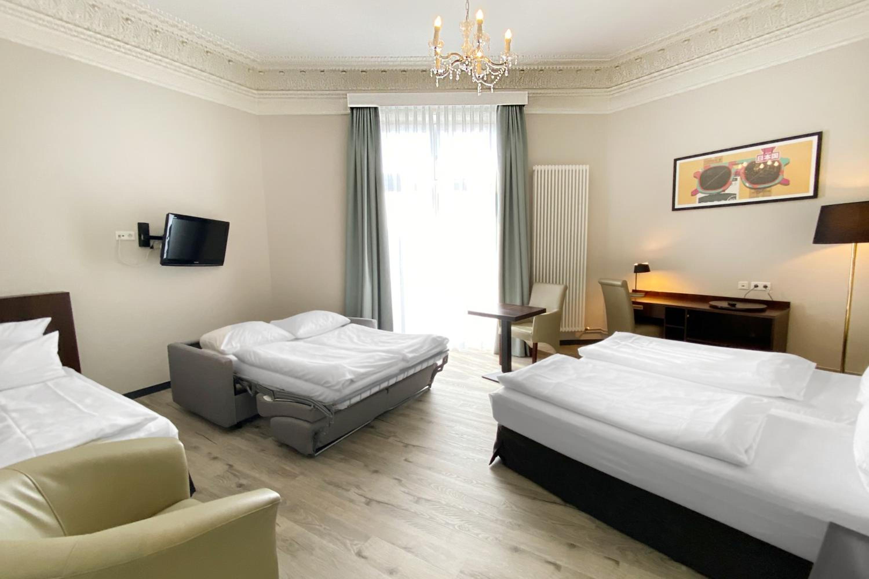 Premium Family King Room with One Single Bed and Two Single Sofa Beds