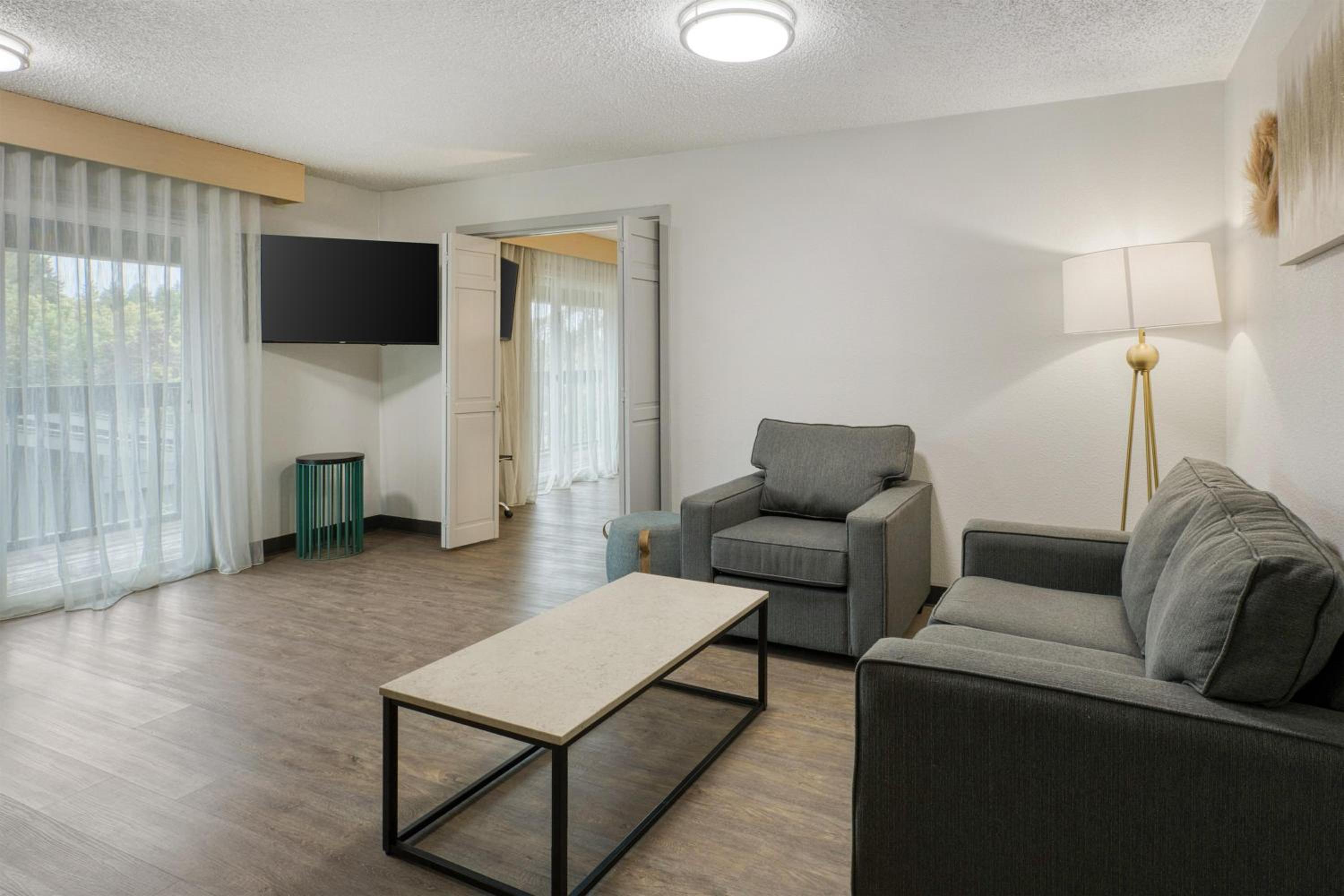 Two-Bedroom Queen Suite with Sofa Bed and Kitchen