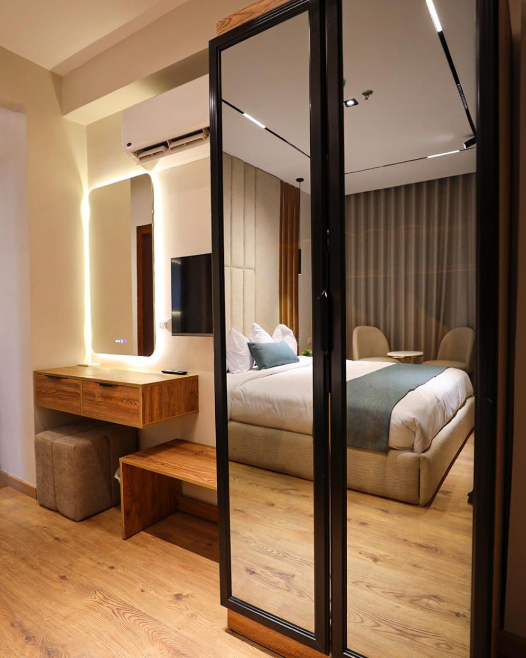 Standard Suite with Balcony City and Partial Pyramid View