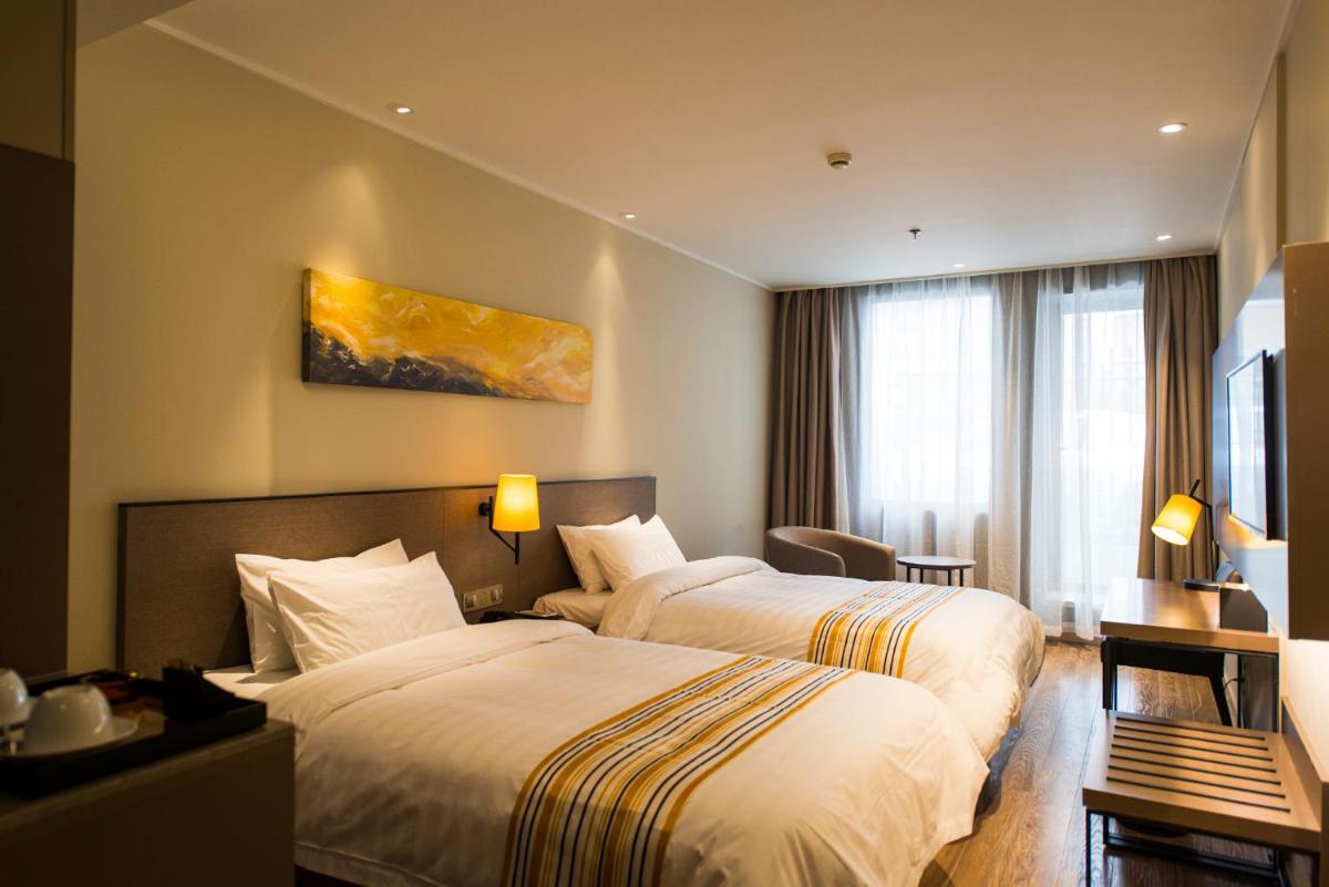 Standard Twin Room - Photo 1