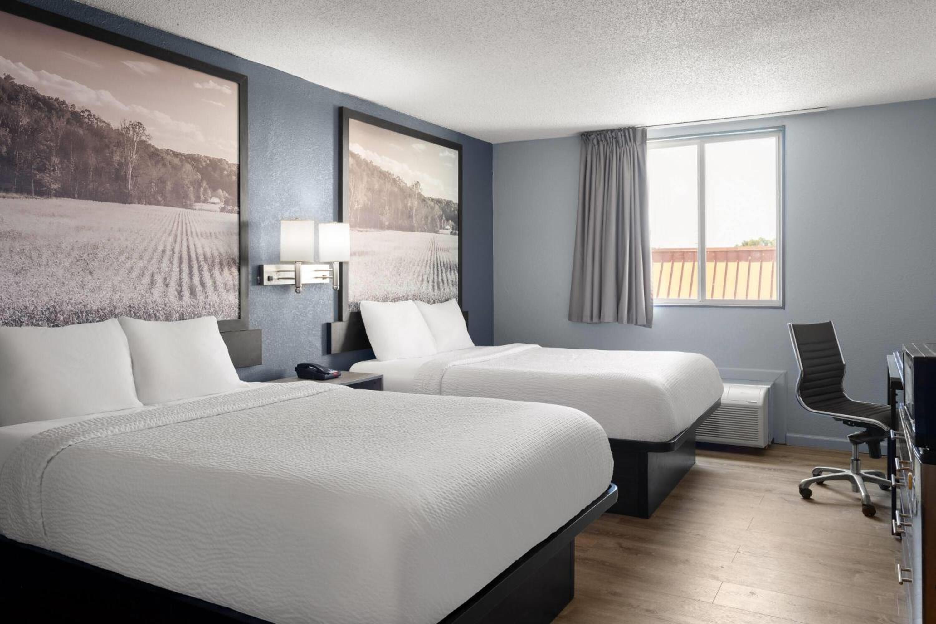 Deluxe Queen Room with Two Queen Beds - Non-Smoking photo 1