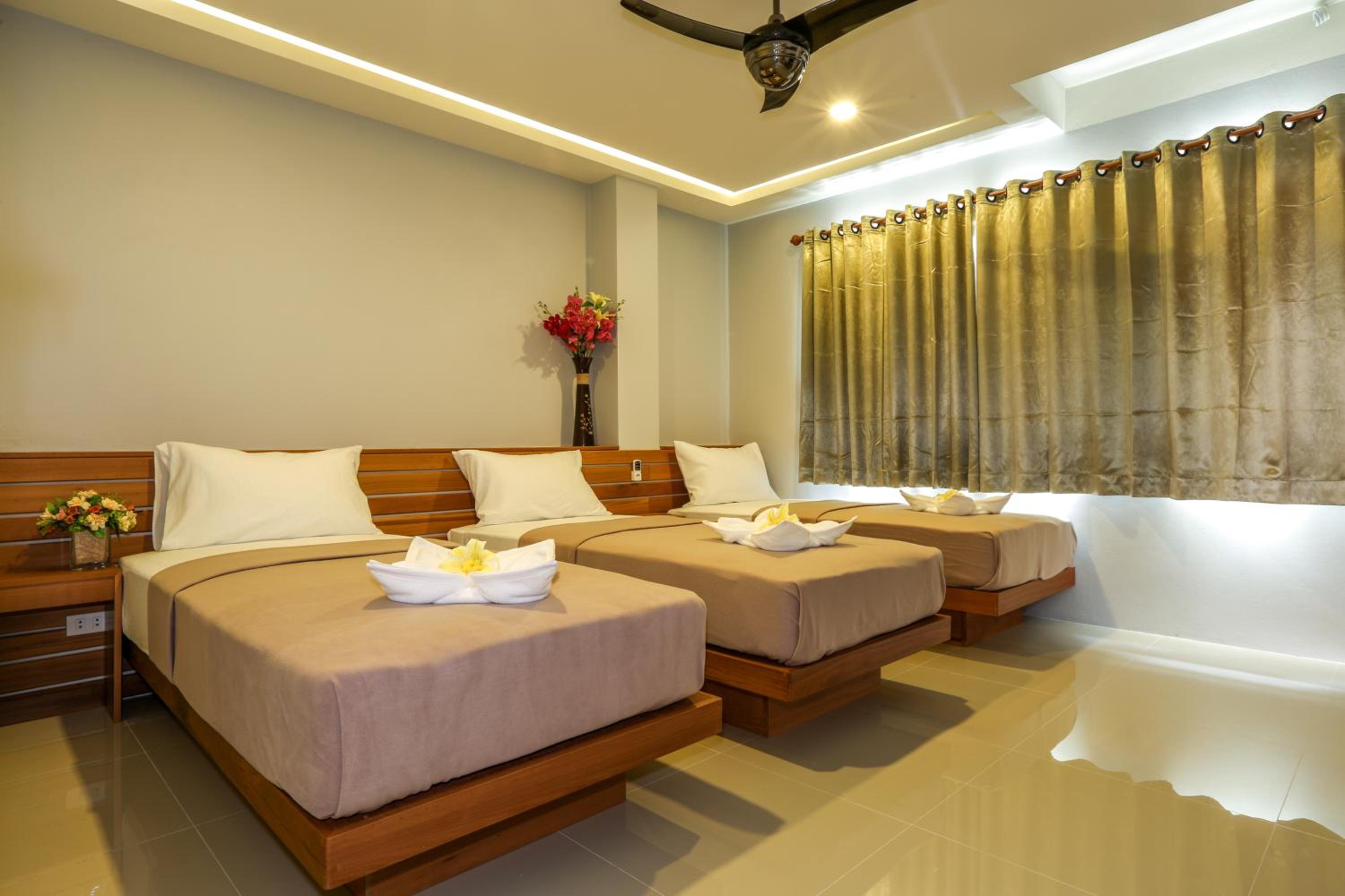 Standard Triple Room with Air Conditioning