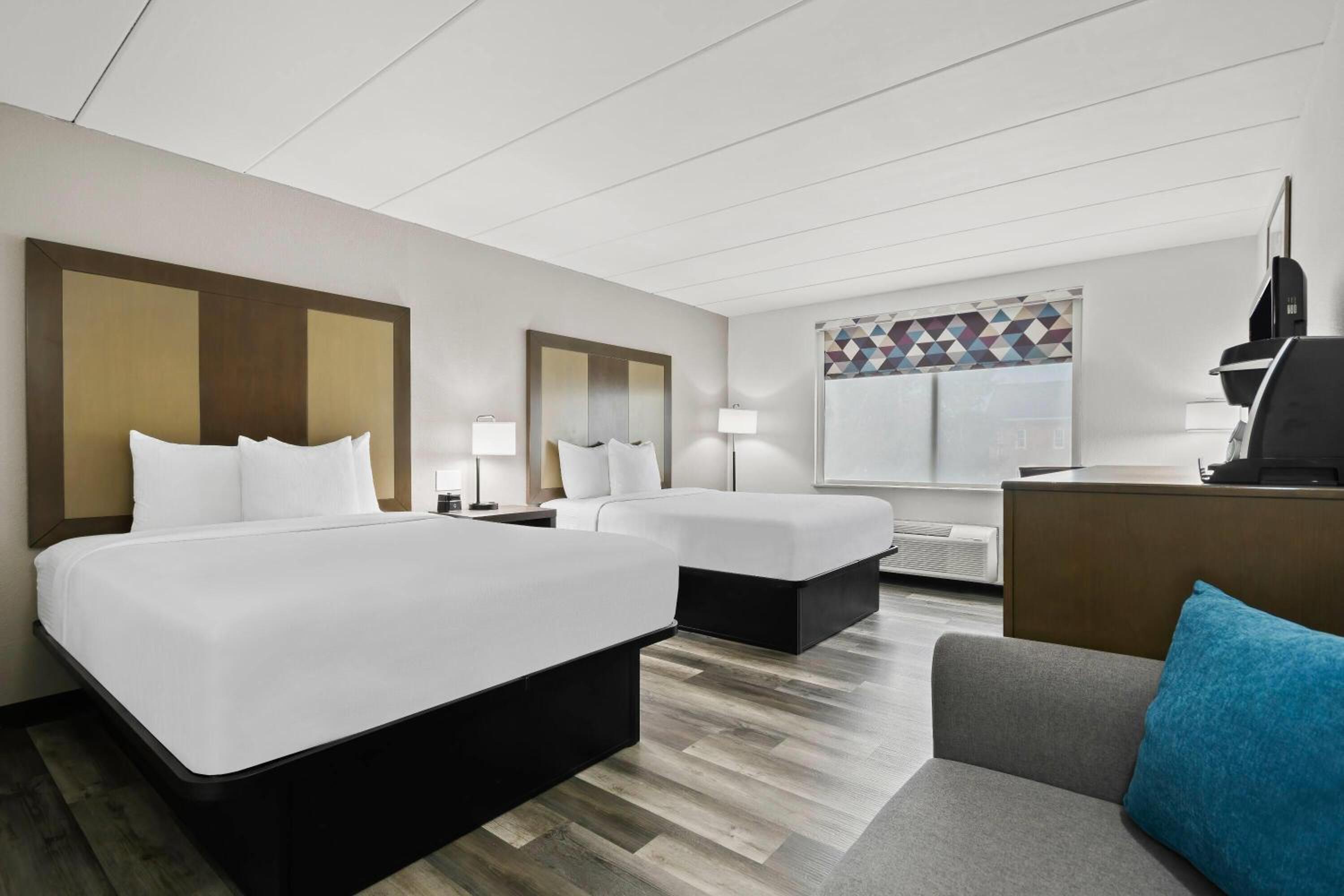 Deluxe Queen Room with Two Queen Beds - Photo 1