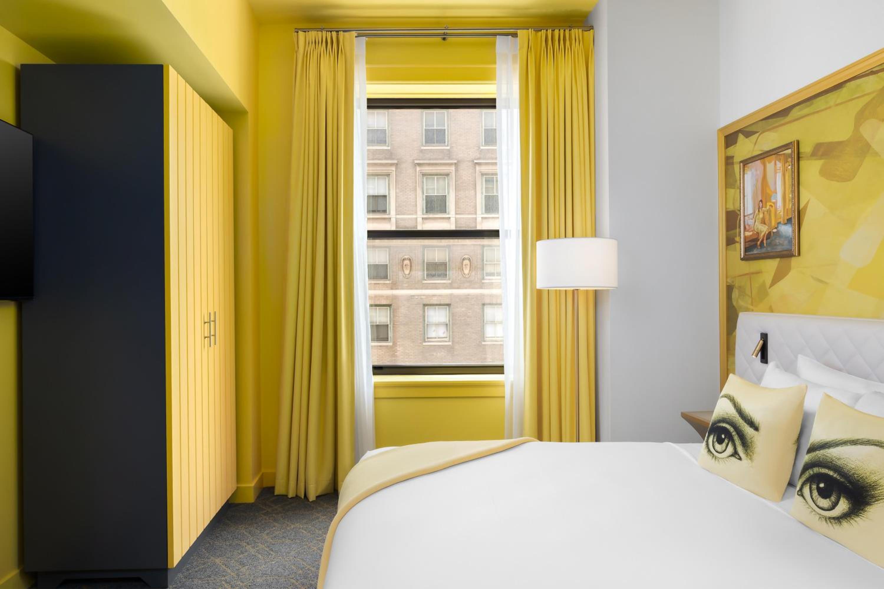 One-Bedroom Yellow King Suite with Kitchenette - Photo 1