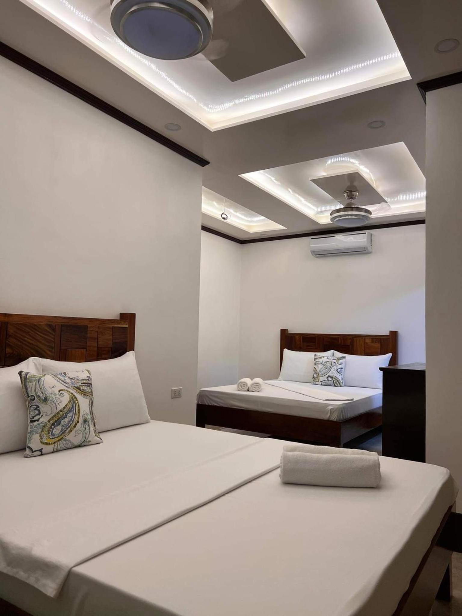 Quadruple Room with Balcony - Photo 1