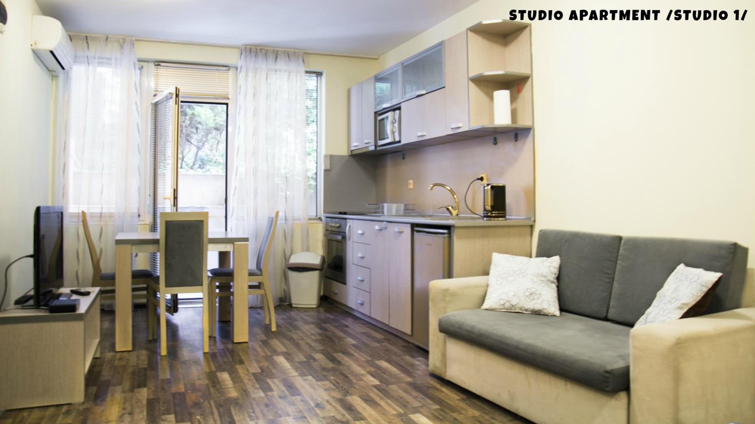 Studio Apartment with Balcony - Ground Floor - Photo 1