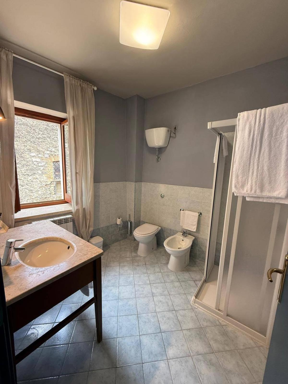 Quadruple Room with Private Bathroom