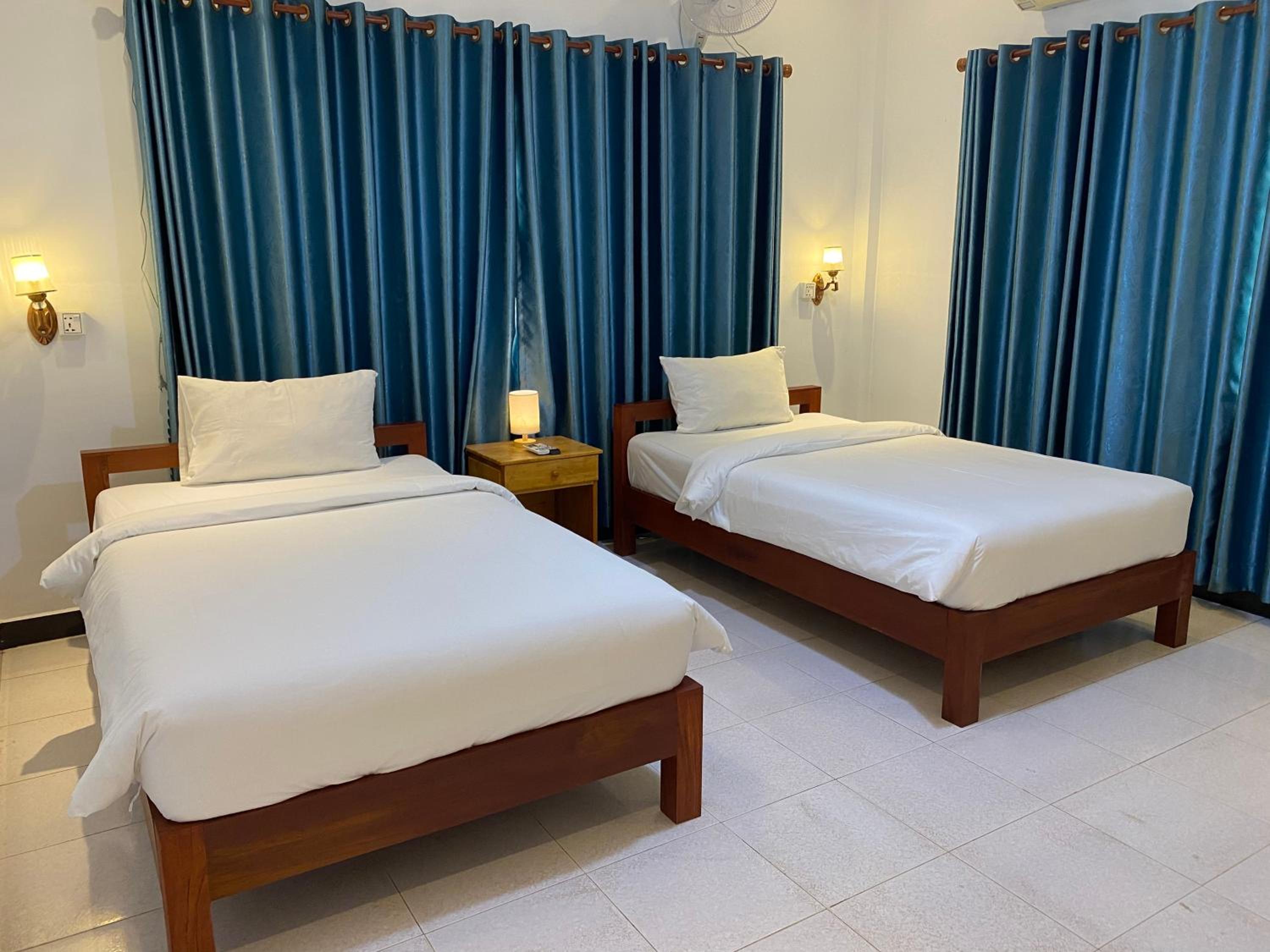 Standard Twin Room - Photo 1