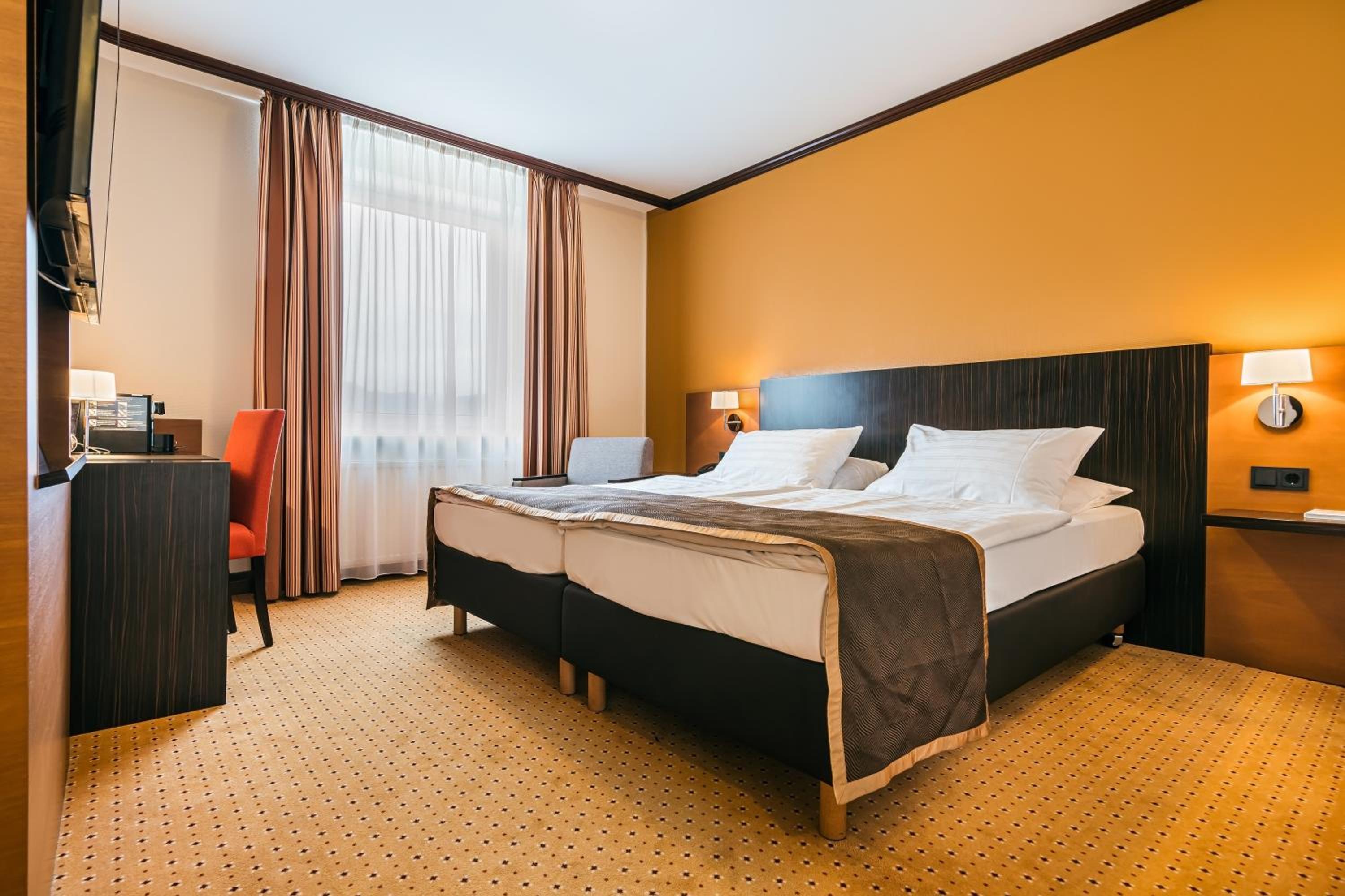 Comfort double room with twin beds - barrier-free photo 2