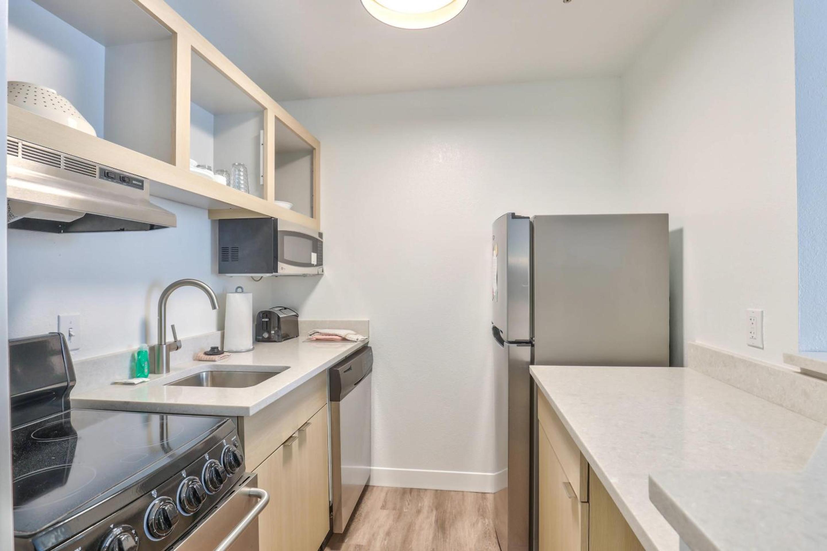 Two-Bedroom Suite with Two Queen Beds, Kitchen, and Sofabed