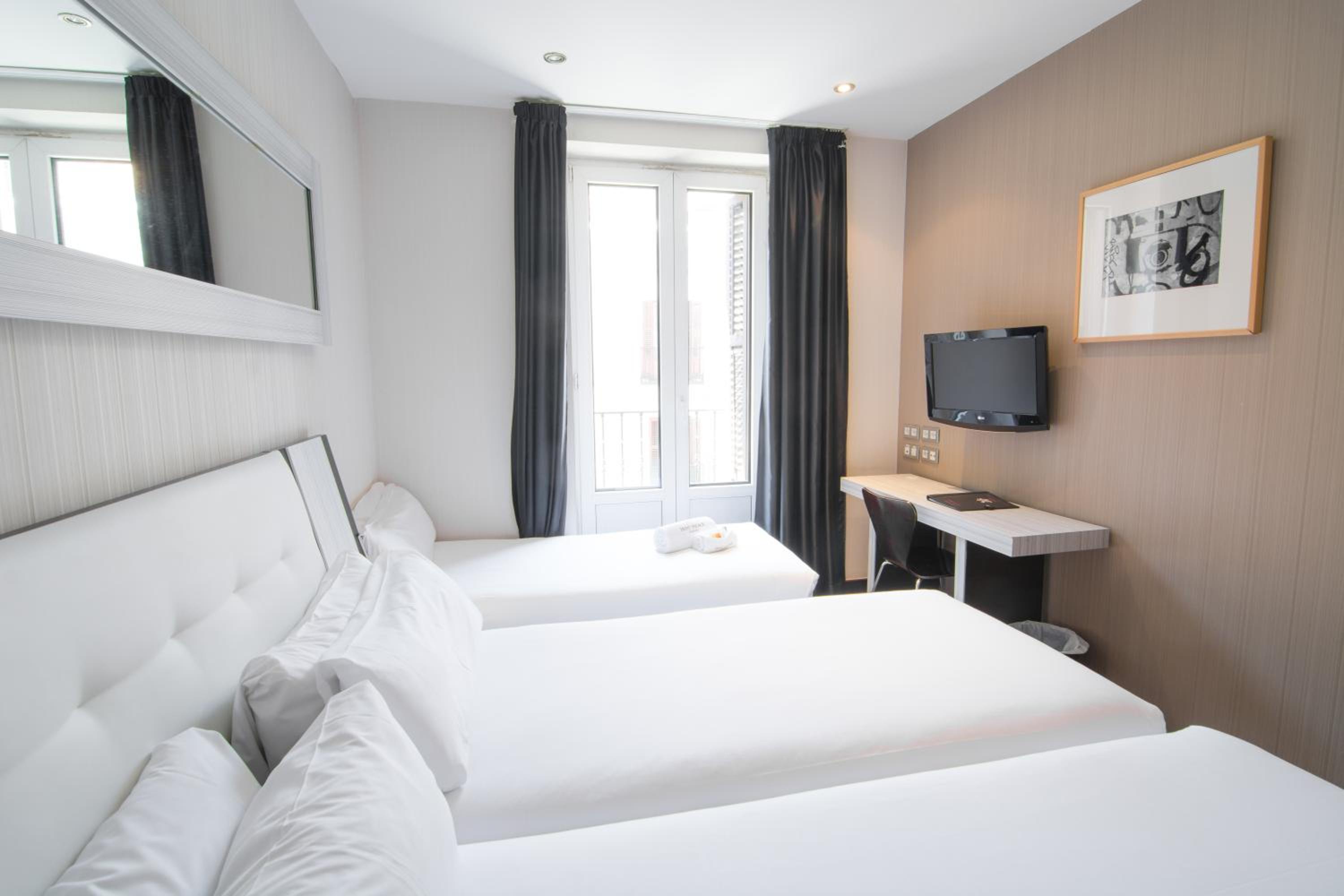 Triple Room - Photo 1