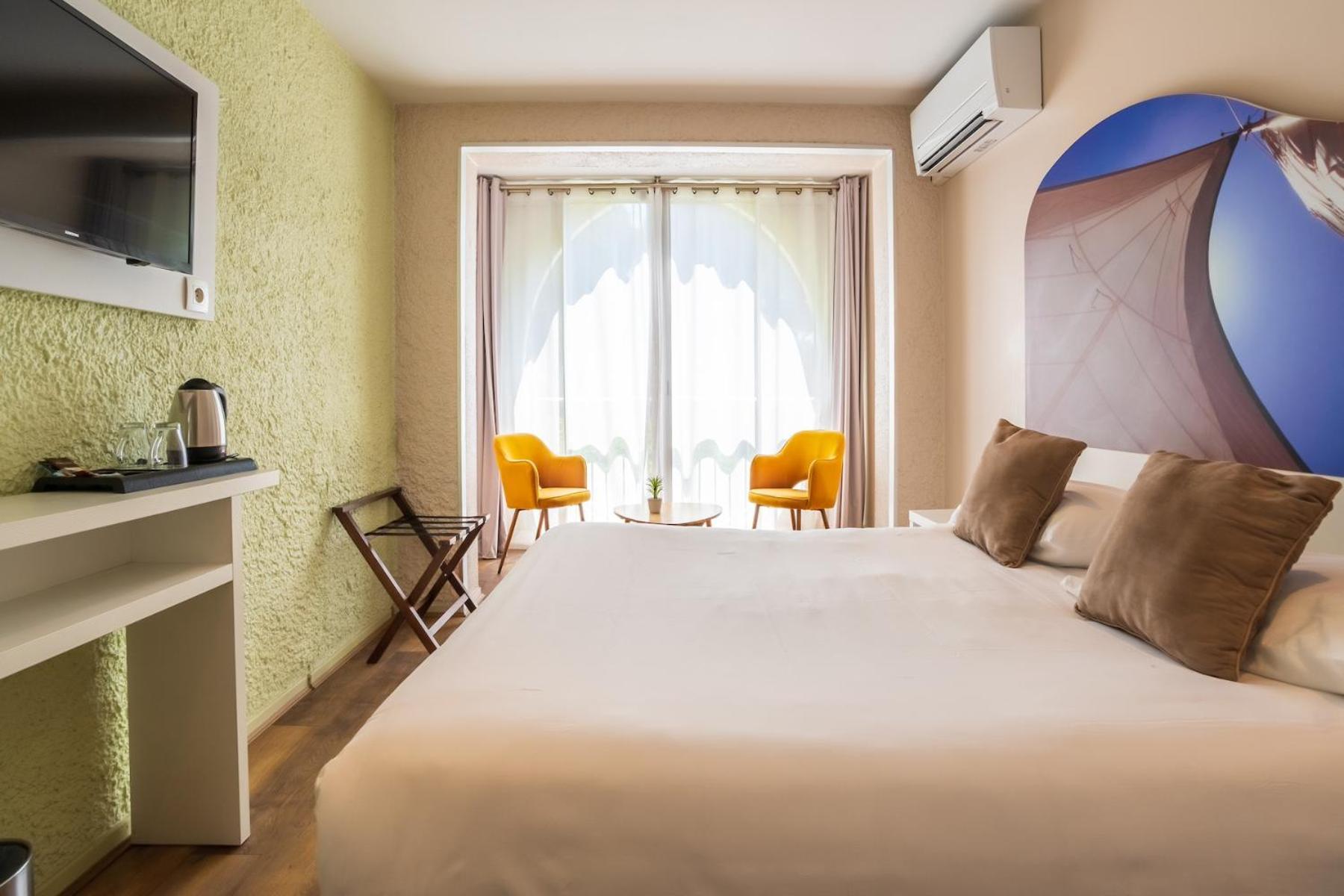 Chambre Double - Tribord - Coin salon photo 1