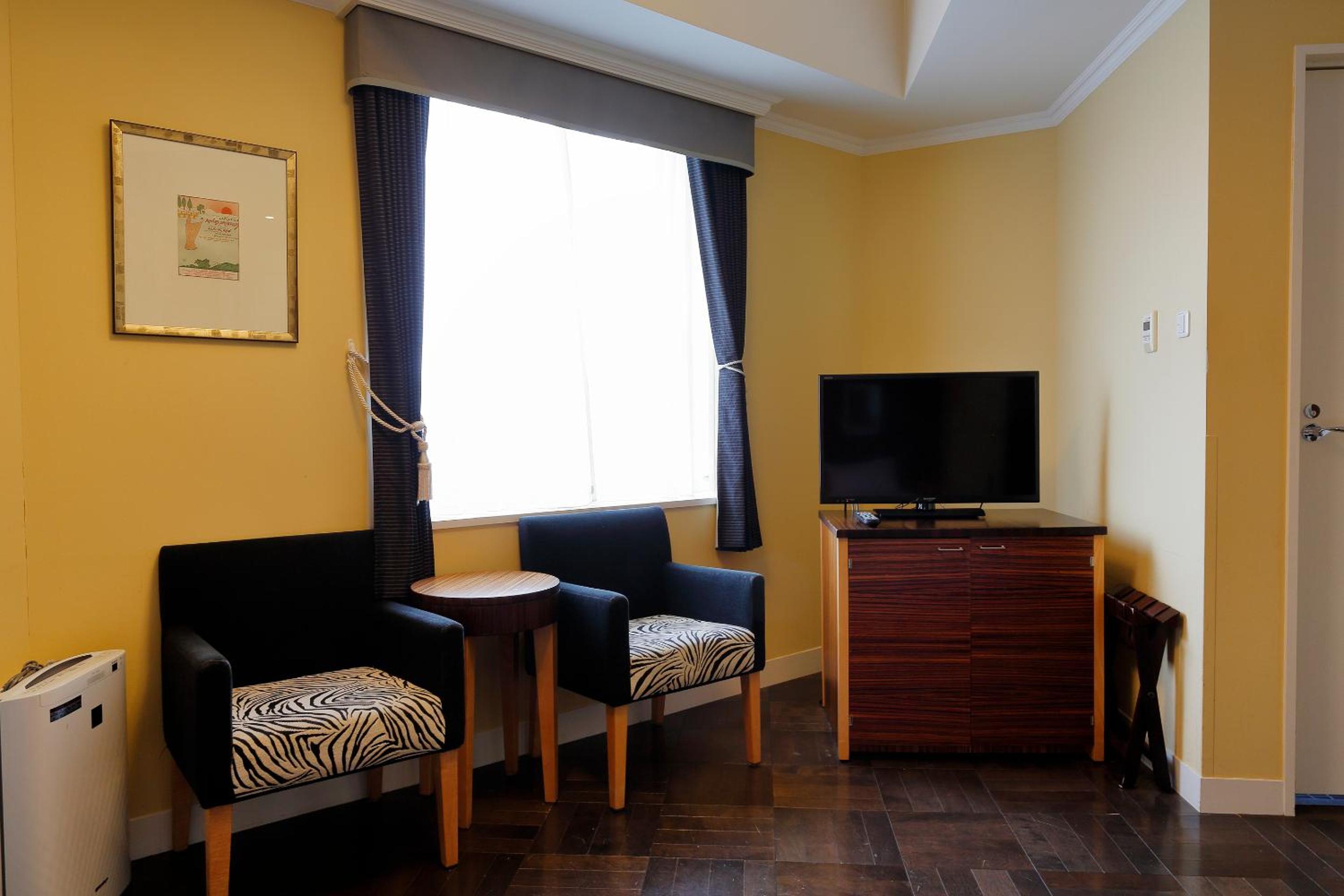 Corner Twin Room - Non-Smoking - Photo 13