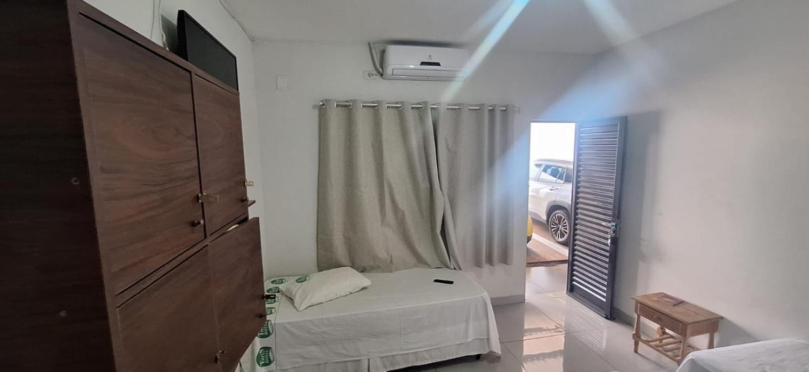 Economy Triple Room photo 2
