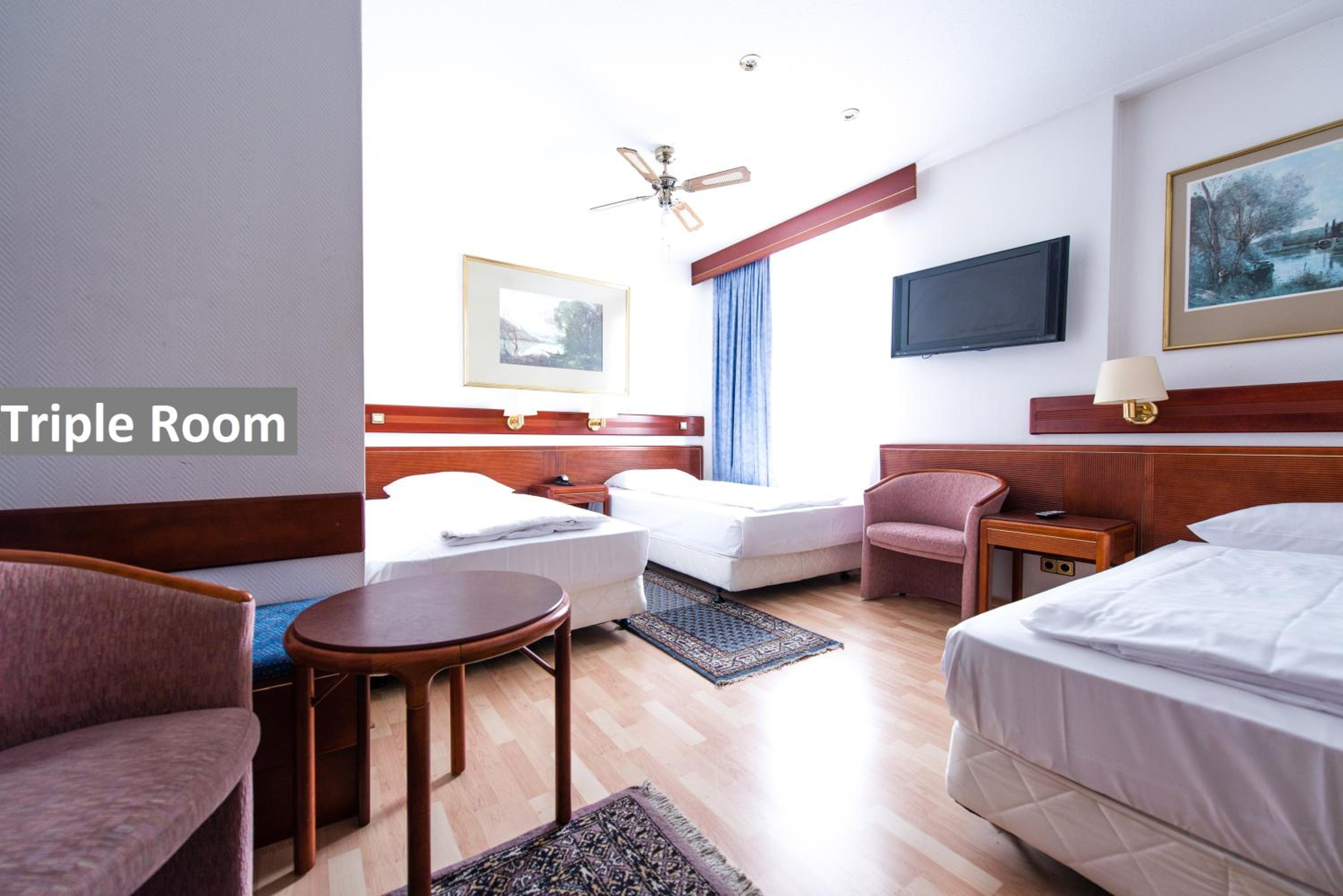 Triple Room - Photo 1