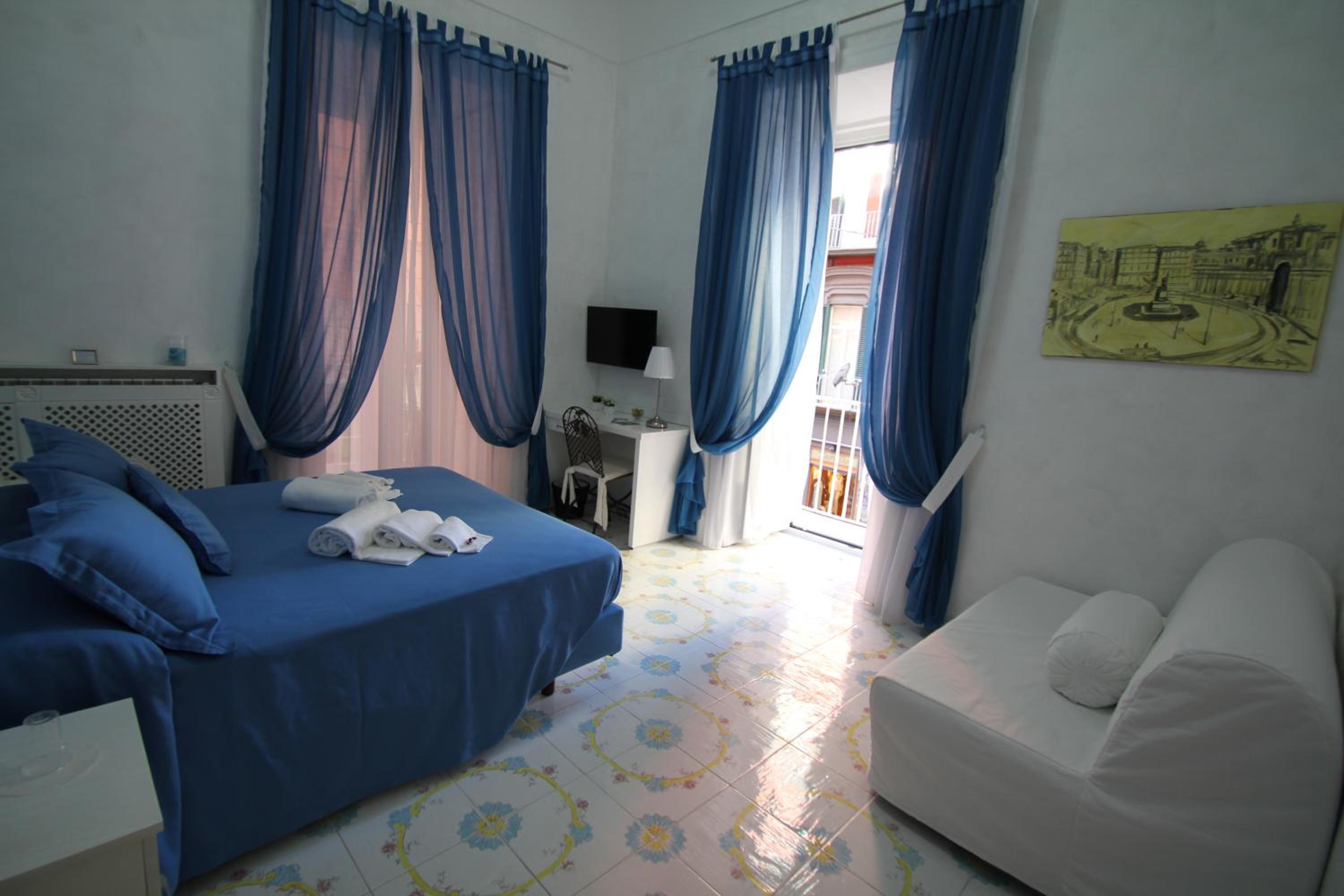 Quadruple Room with Private Bathroom