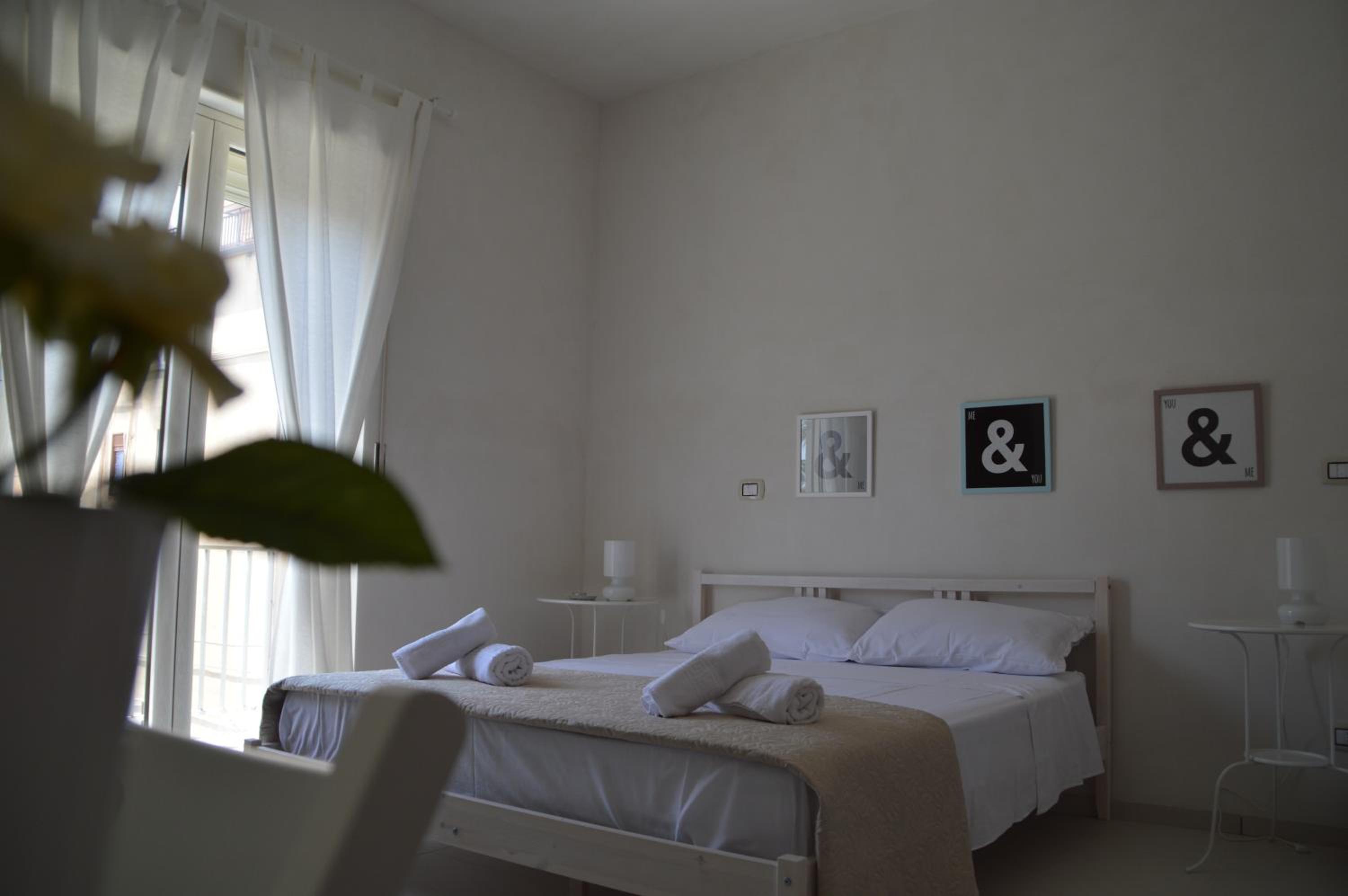 Quadruple Room with Balcony - Photo 7