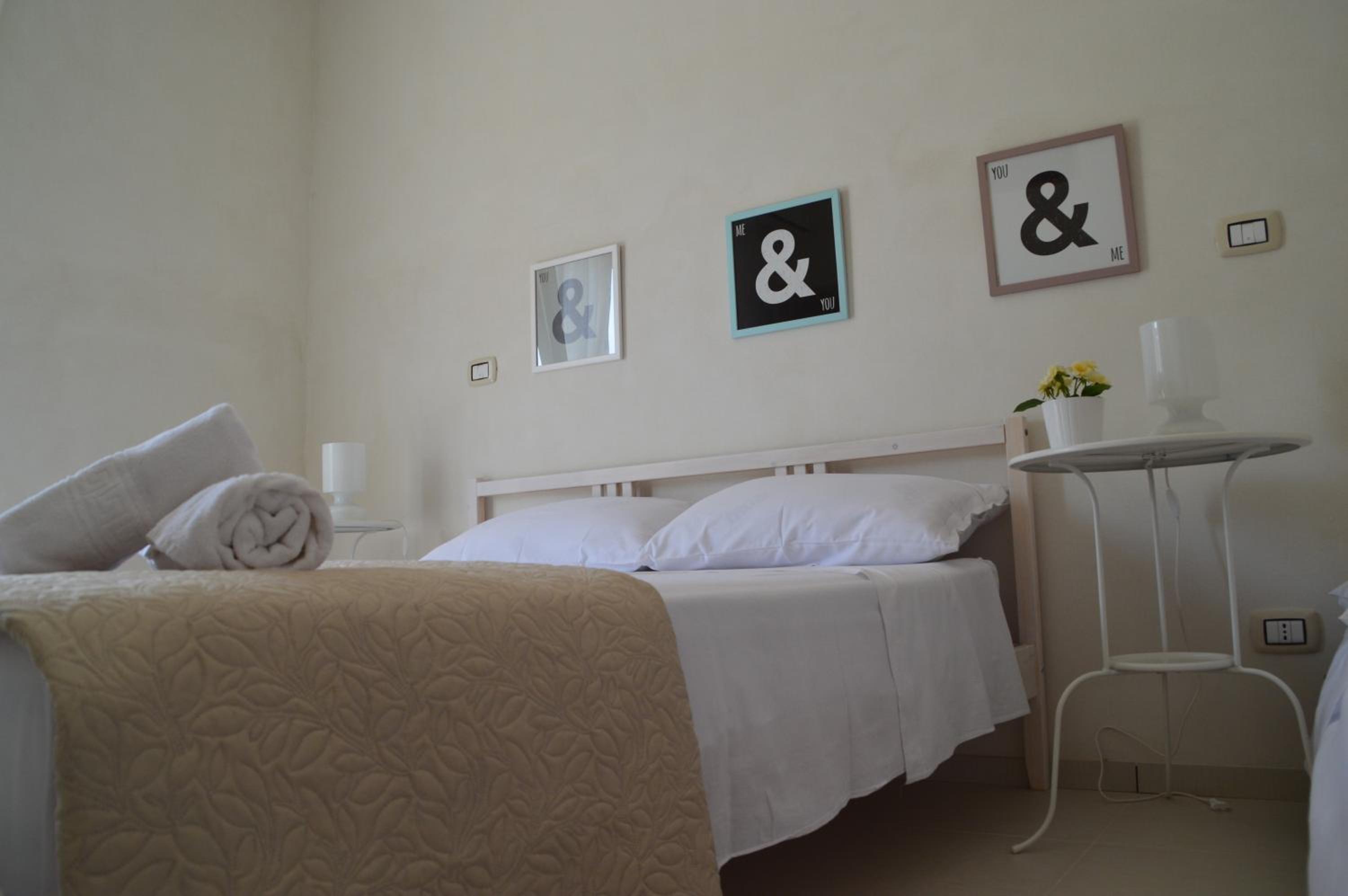 Quadruple Room with Balcony - Photo 11