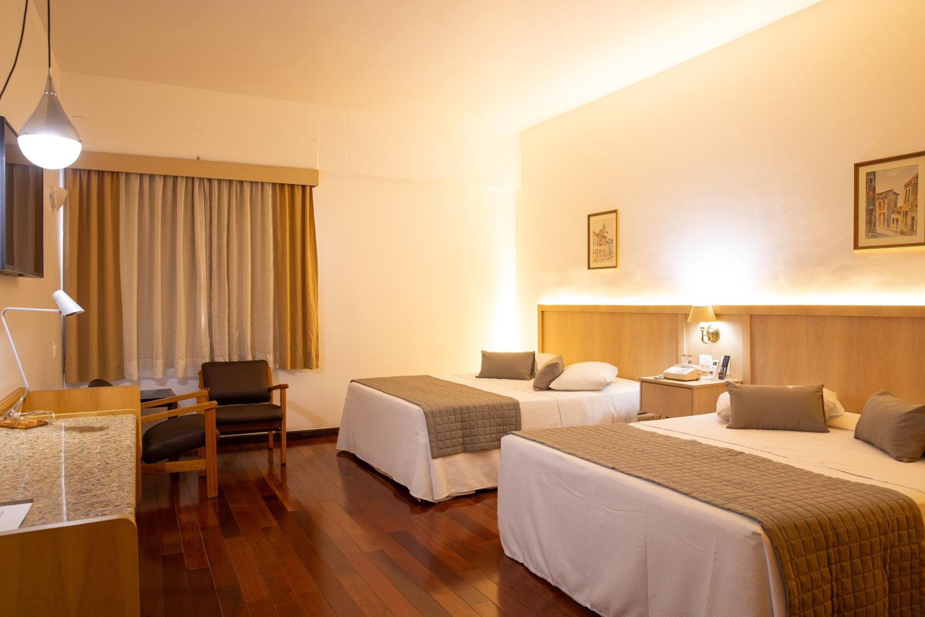 Deluxe Queen Room with Two Queen Beds photo 1