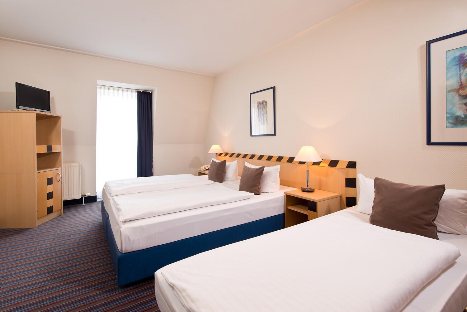 Business Triple Room - Photo 1