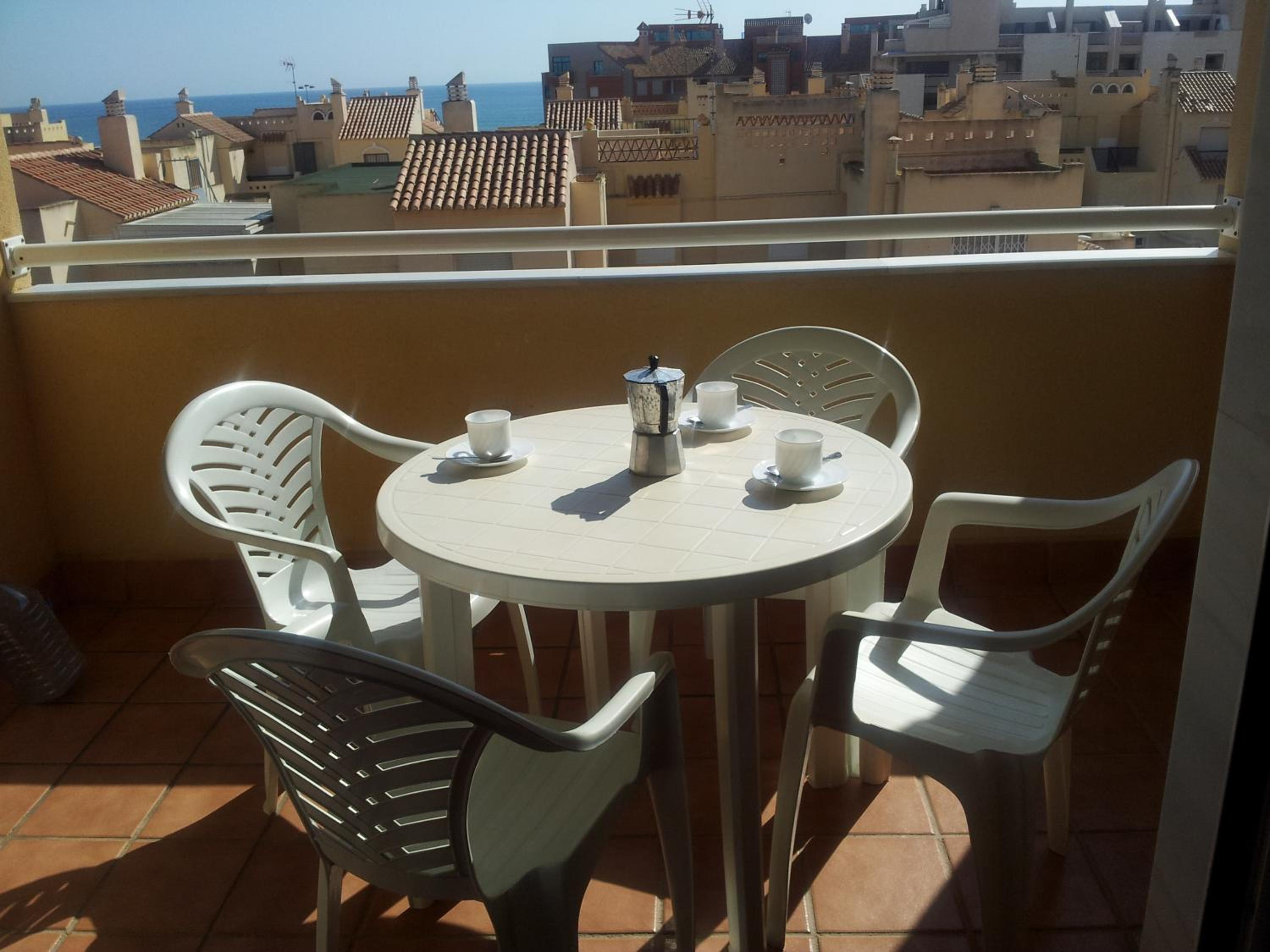 One-bedroom apartment with a pool view photo 3