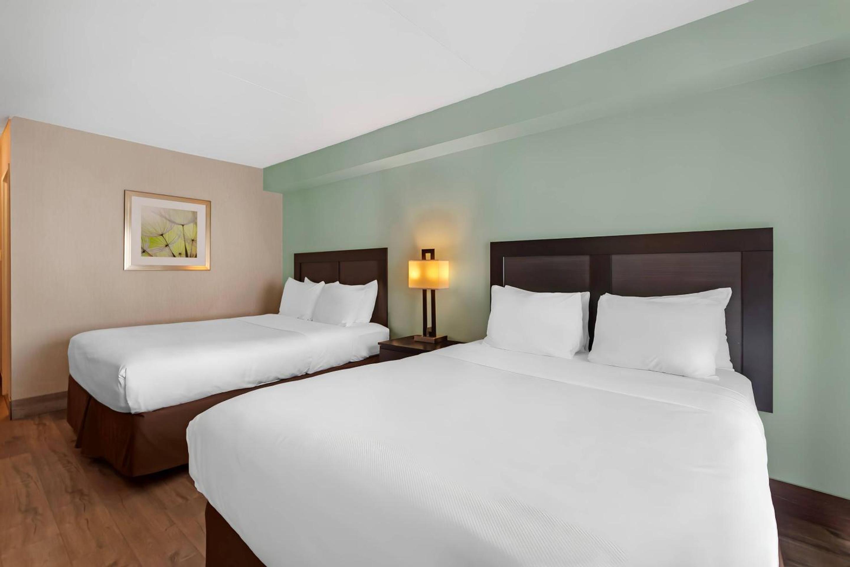 Queen Room with Two Queen Beds - Photo 1