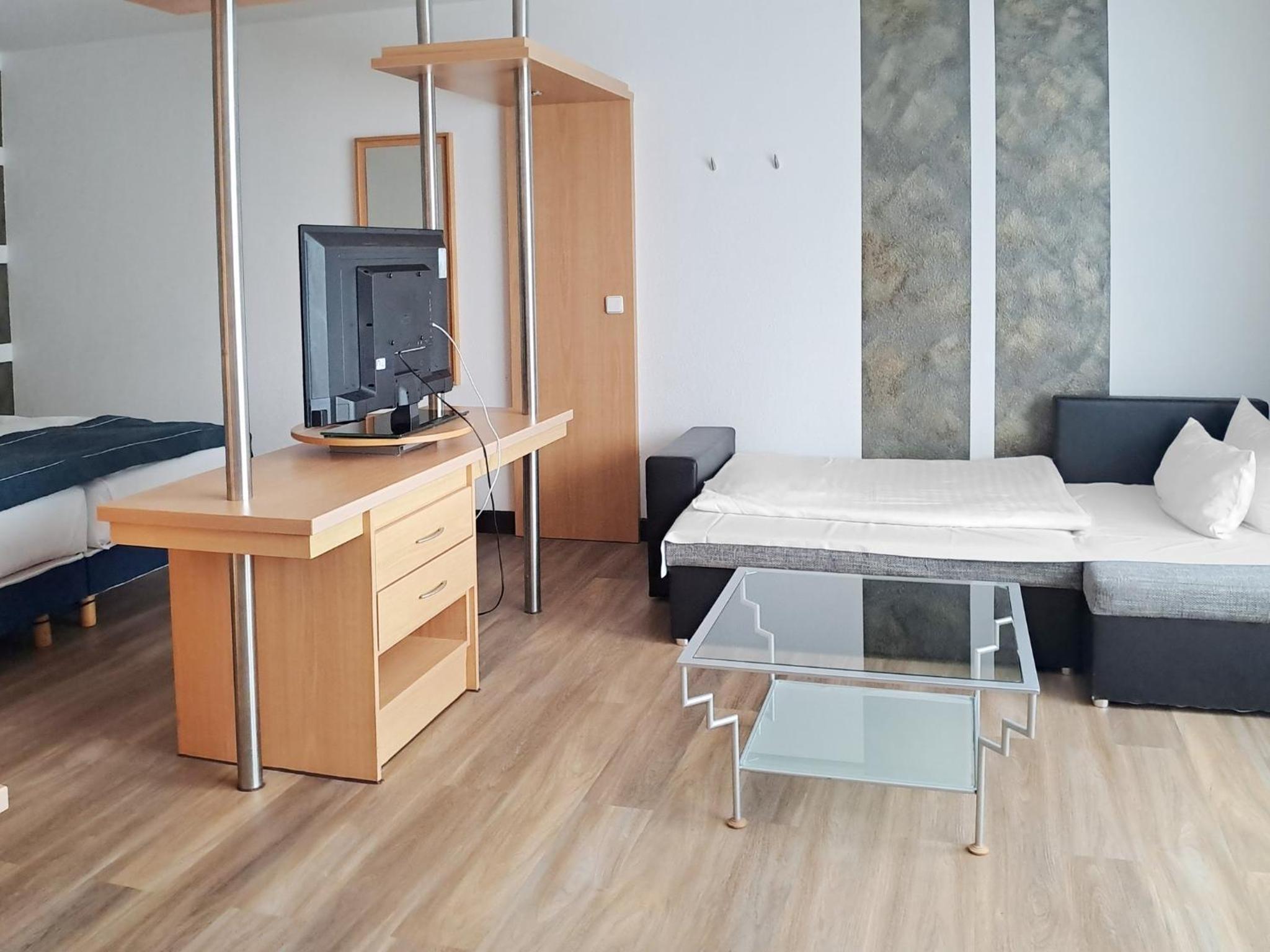 Premium Twin Room with Sofa Bed - Photo 13