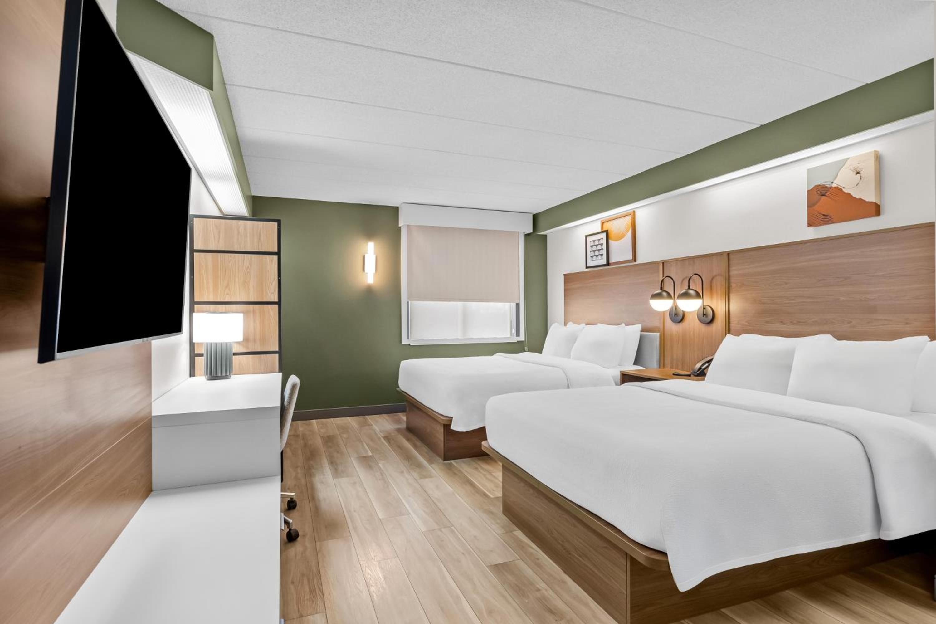 Queen Room with Two Queen Beds - Photo 1