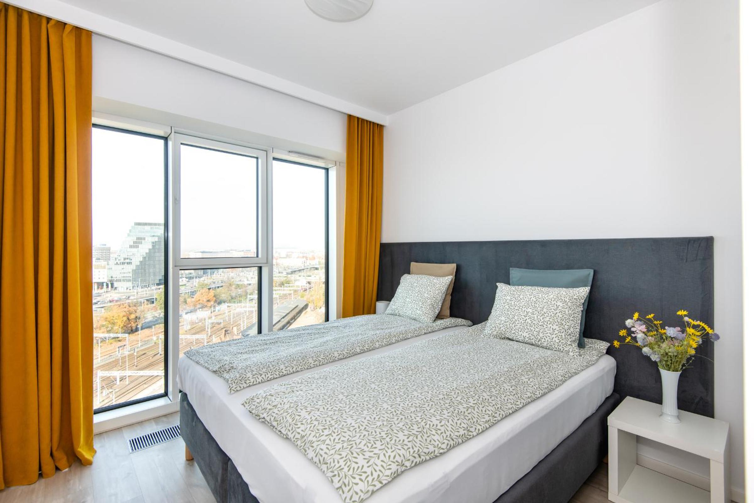 One-Bedroom Apartment with Balcony and City View