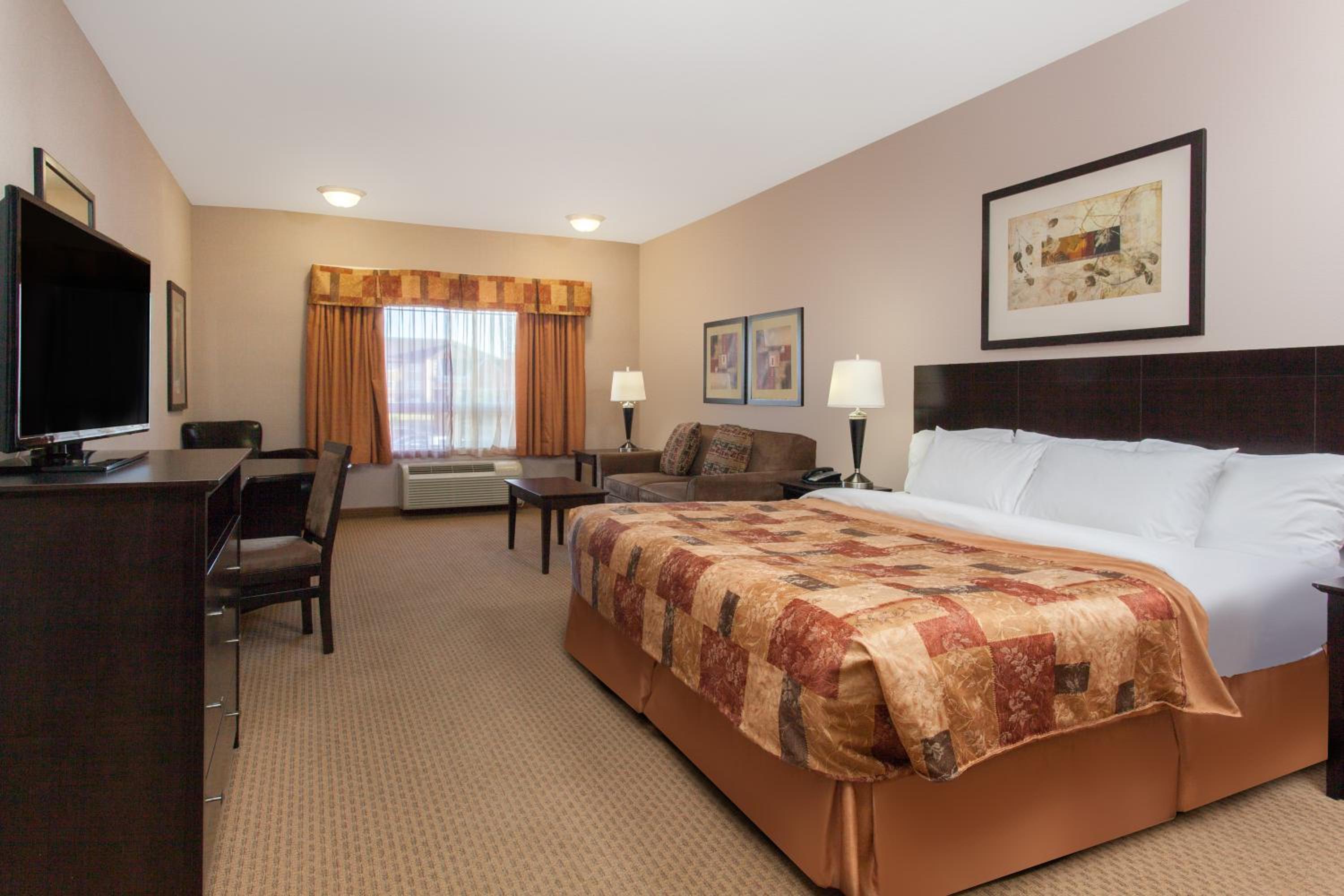 King Room with Sofa Bed - Photo 1