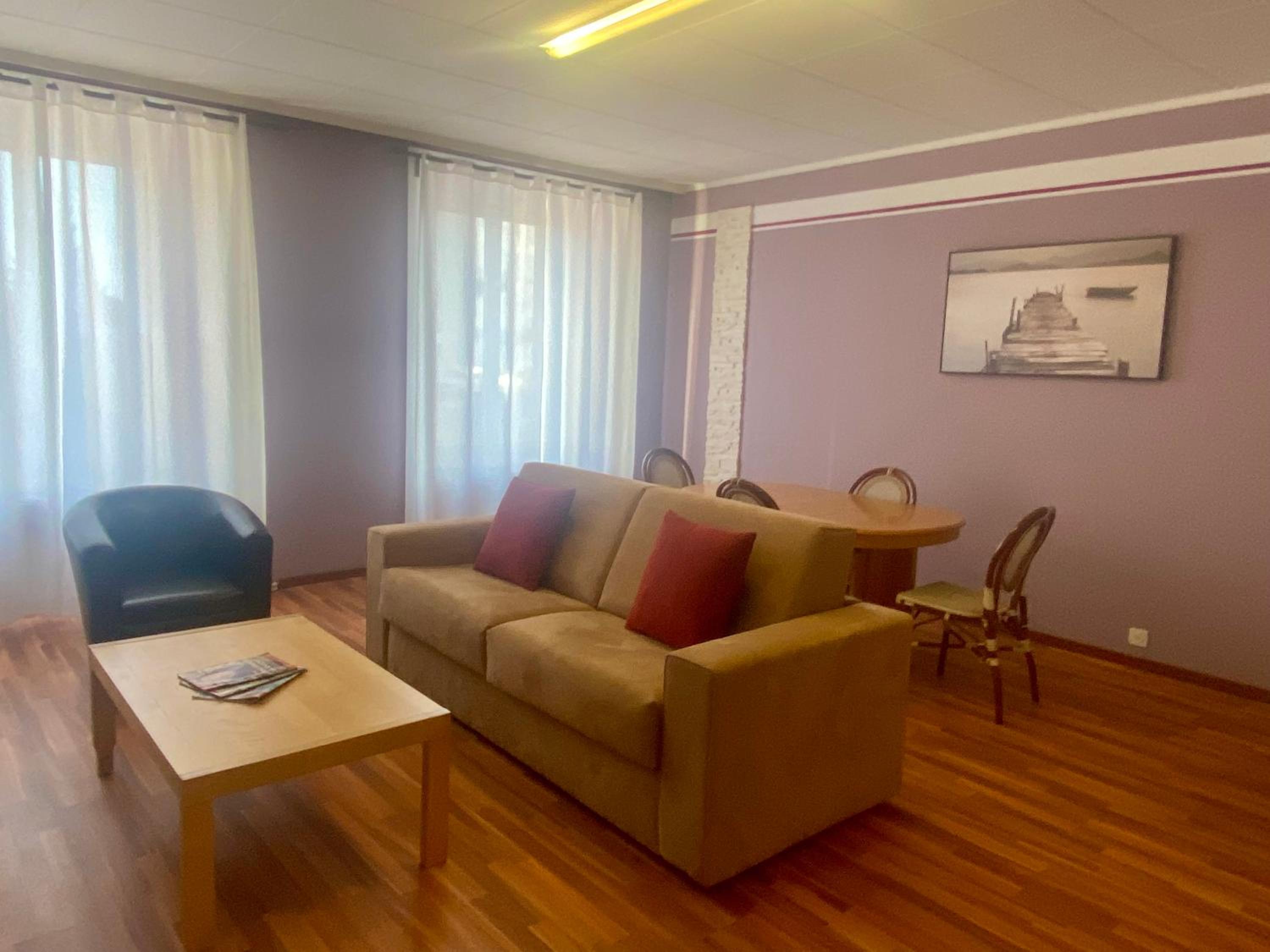 Three-Bedroom Apartment photo 2