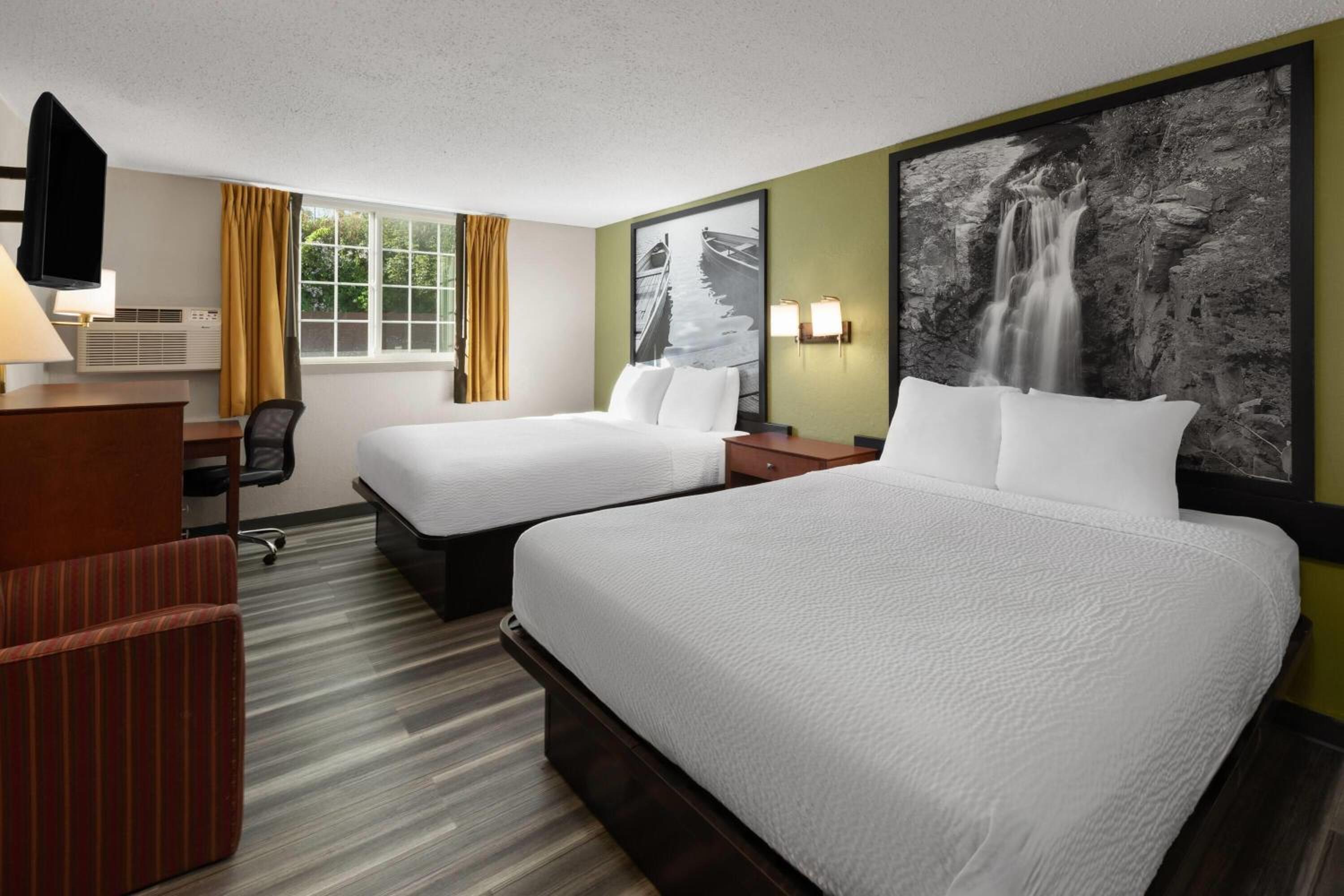 Queen Room with Two Queen Beds - Pet Friendly/Non-Smoking - Photo 1