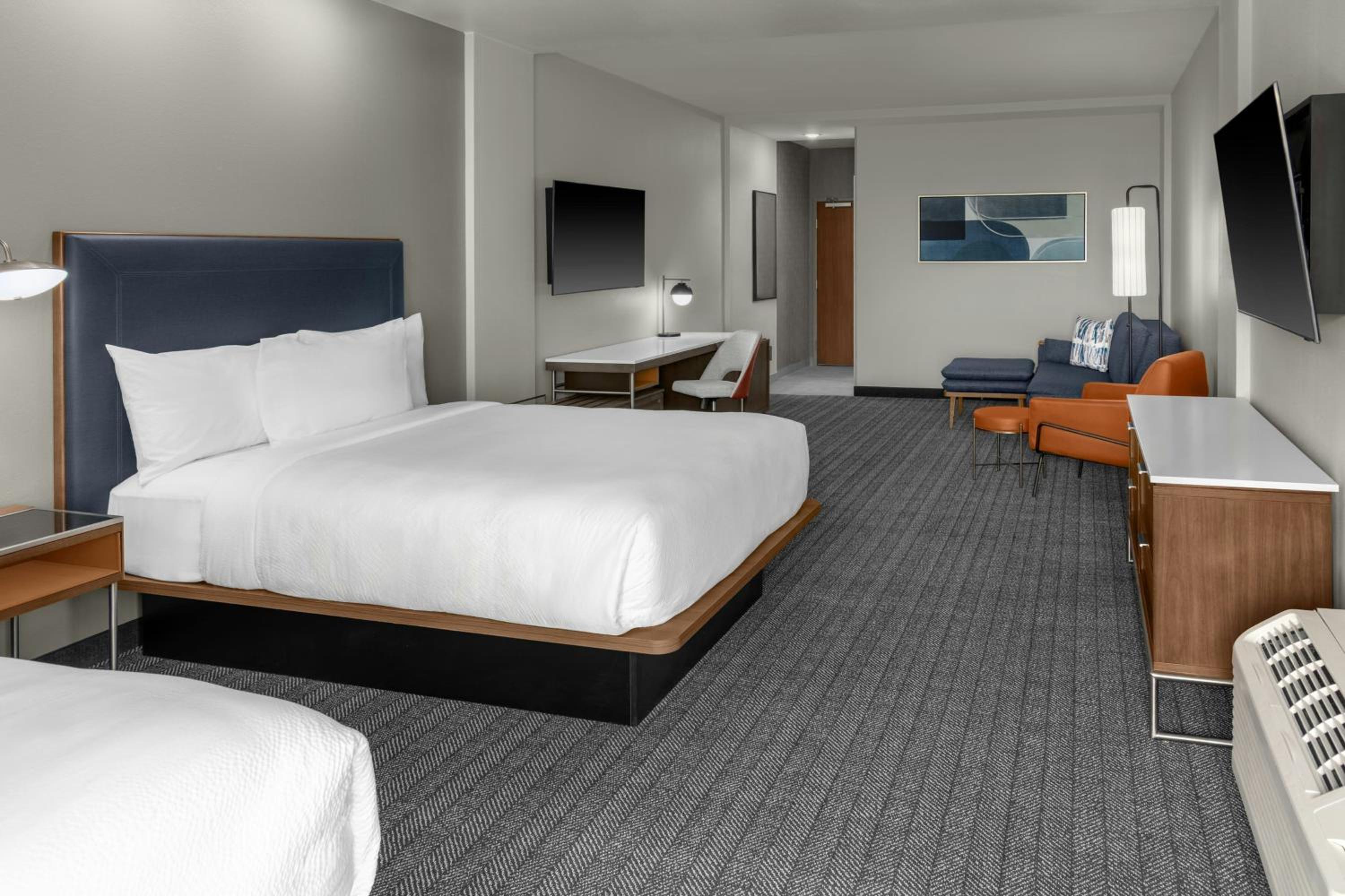 Queen Suite with Two Queen Beds and Sofa Bed photo 2