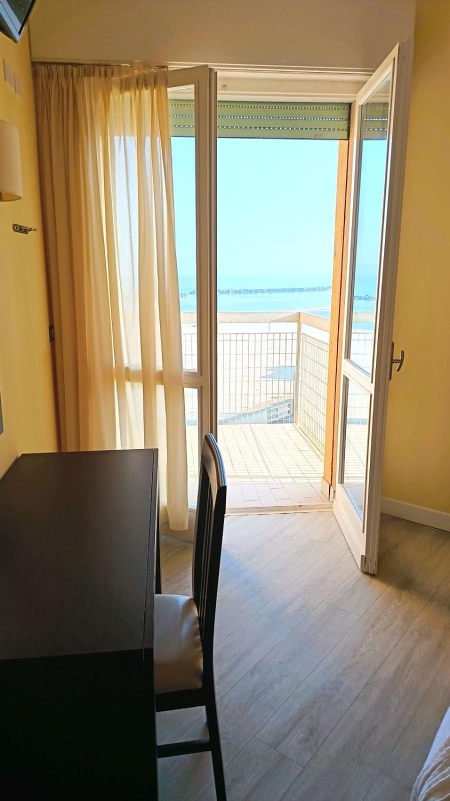Double or Twin Room with Side Sea View photo 3