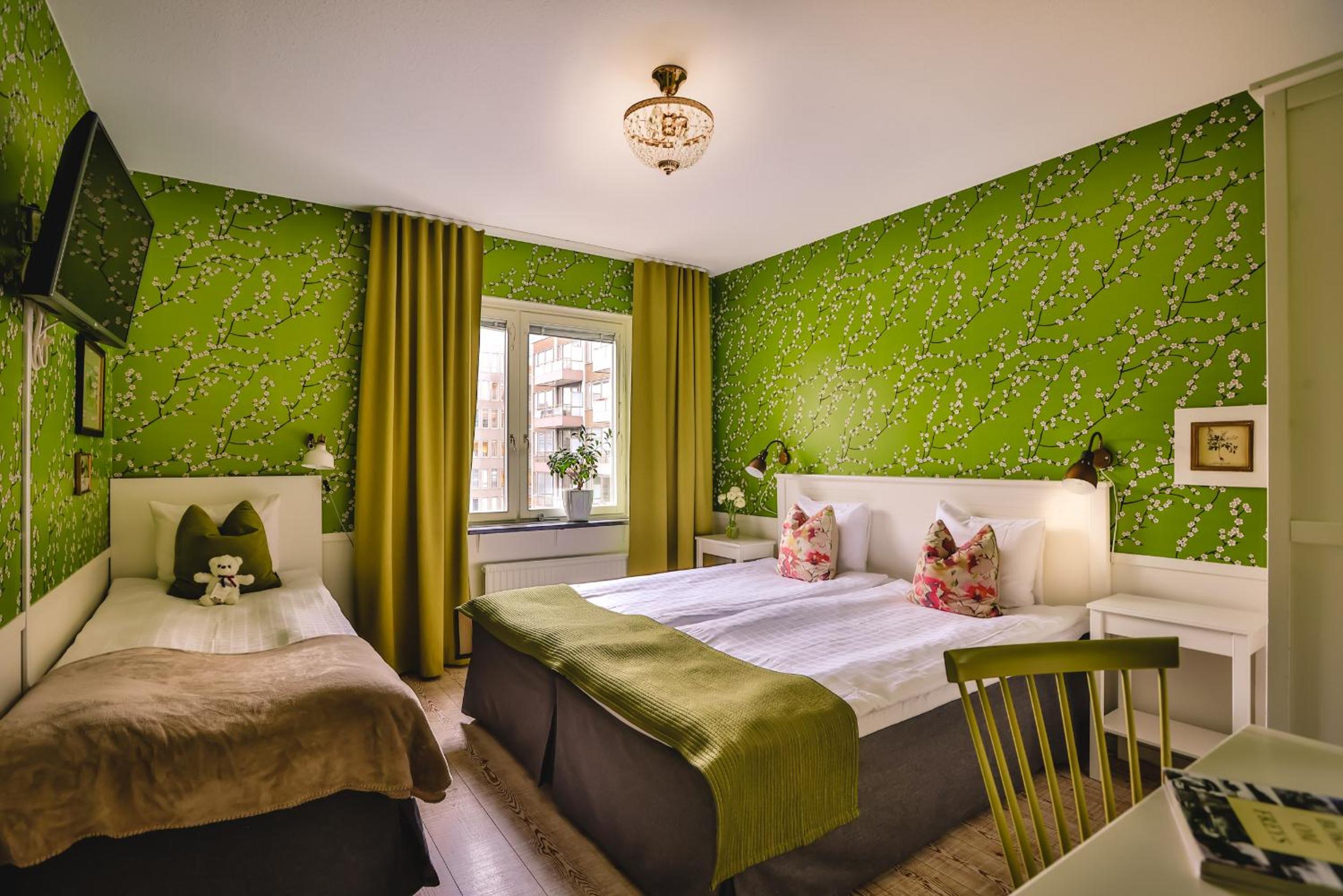 Premium Triple Room - Photo 1