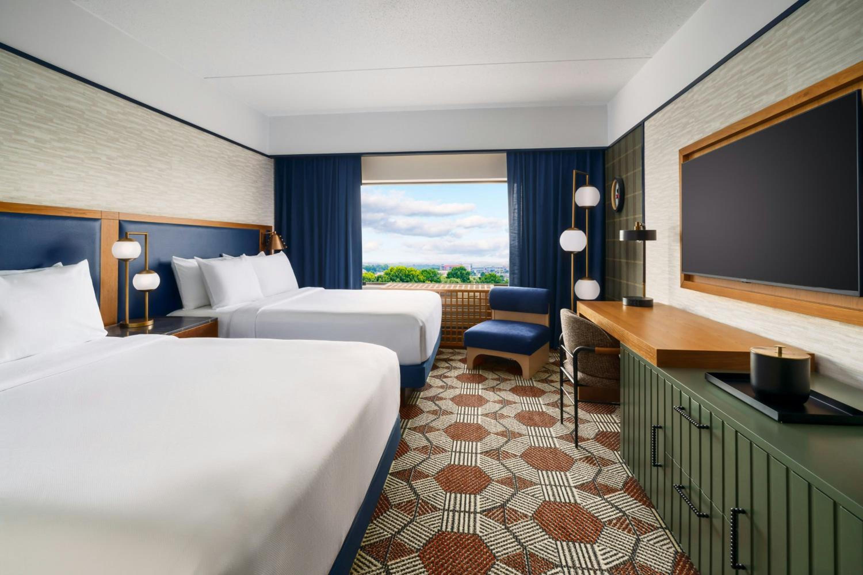 Deluxe Queen Room with Two Queen Beds - Photo 1