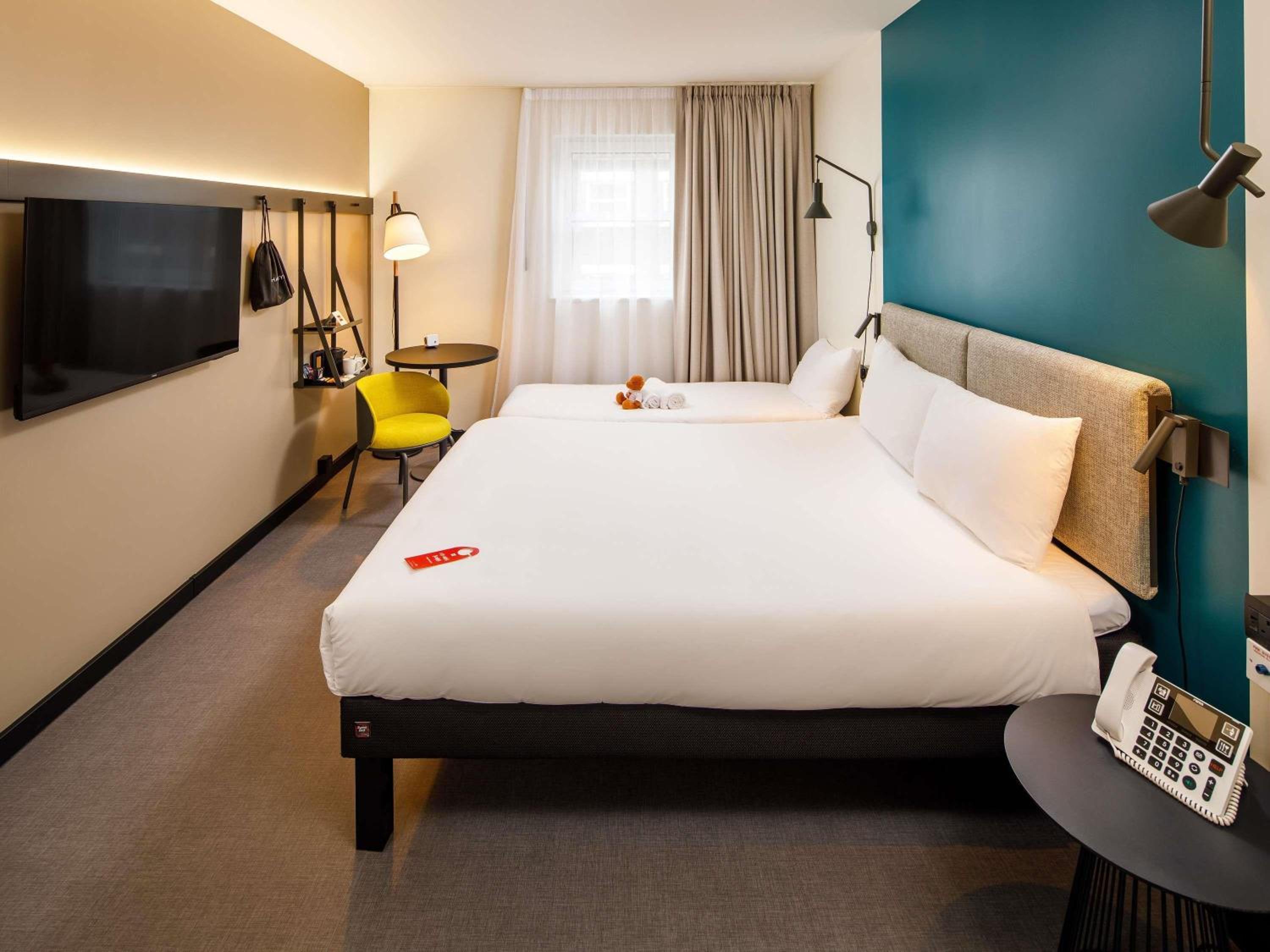 family room with one double and one single bed photo 2