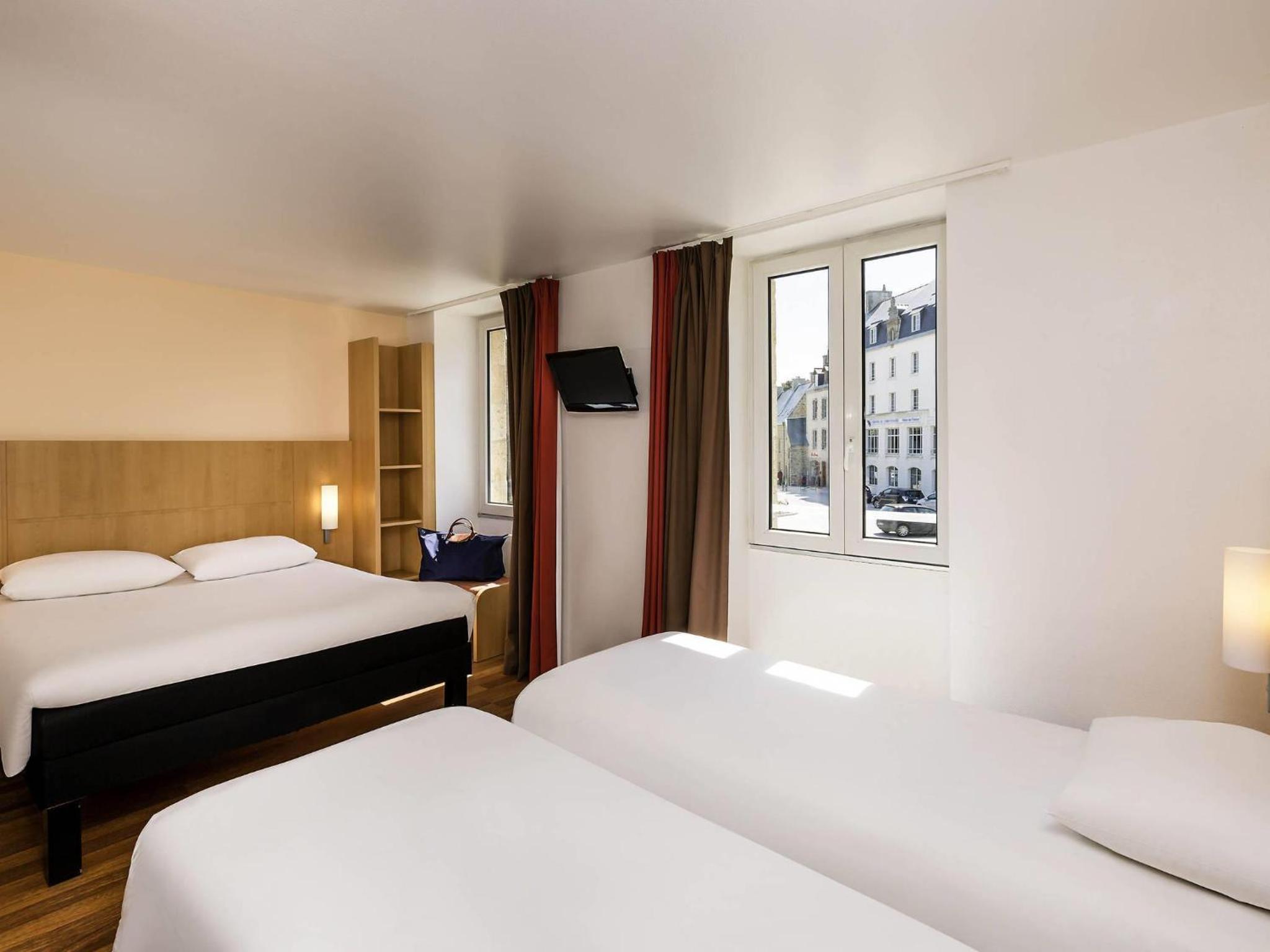 Standard Room with One Double Bed and Two Single Beds - Photo 1