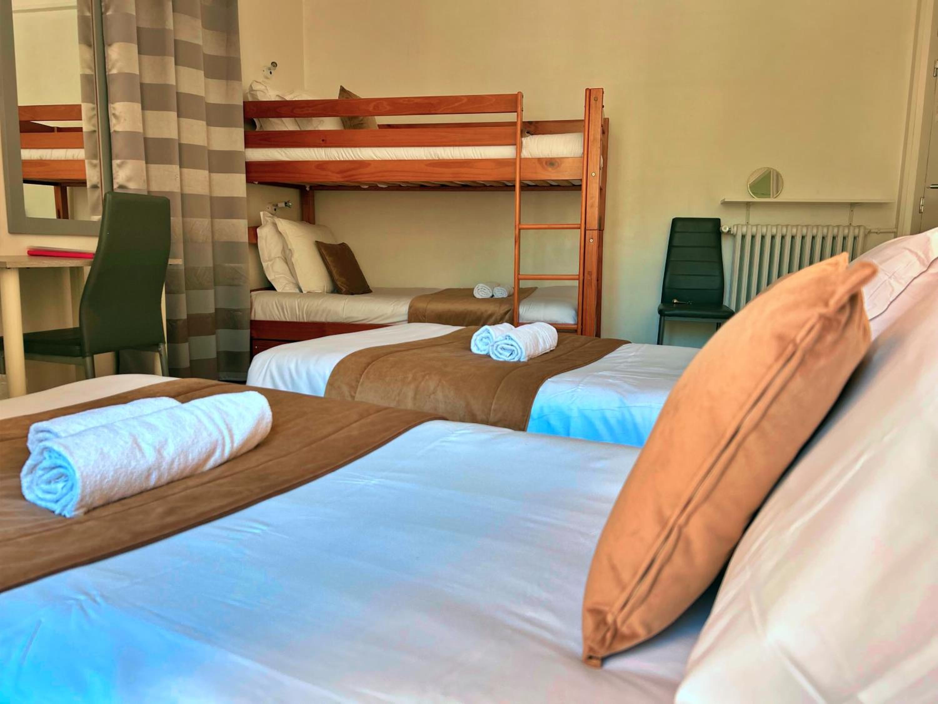 Quadruple Room with Balcony - Photo 1