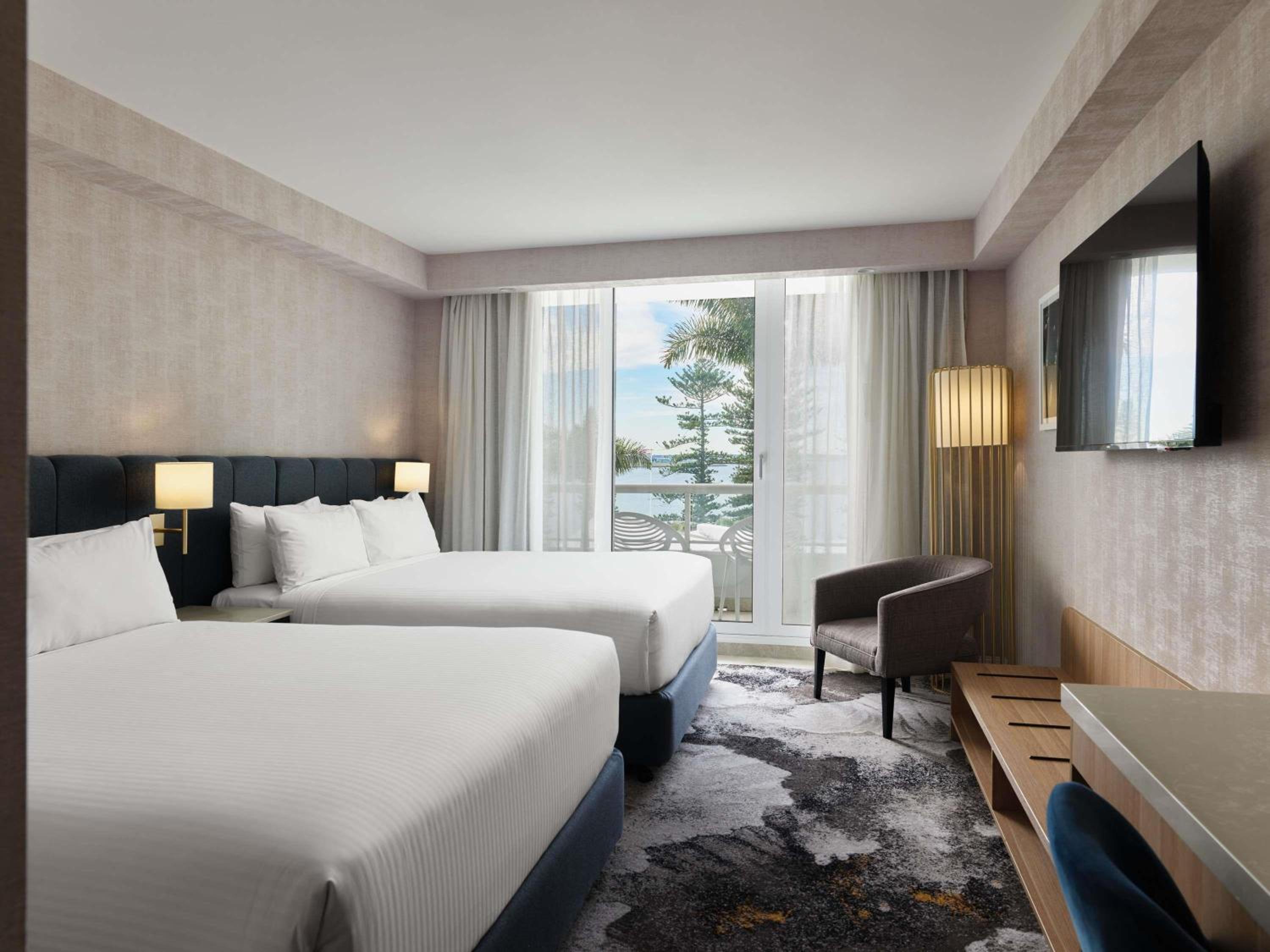Junior Suite with Two Queen Beds, Bath and Bay View