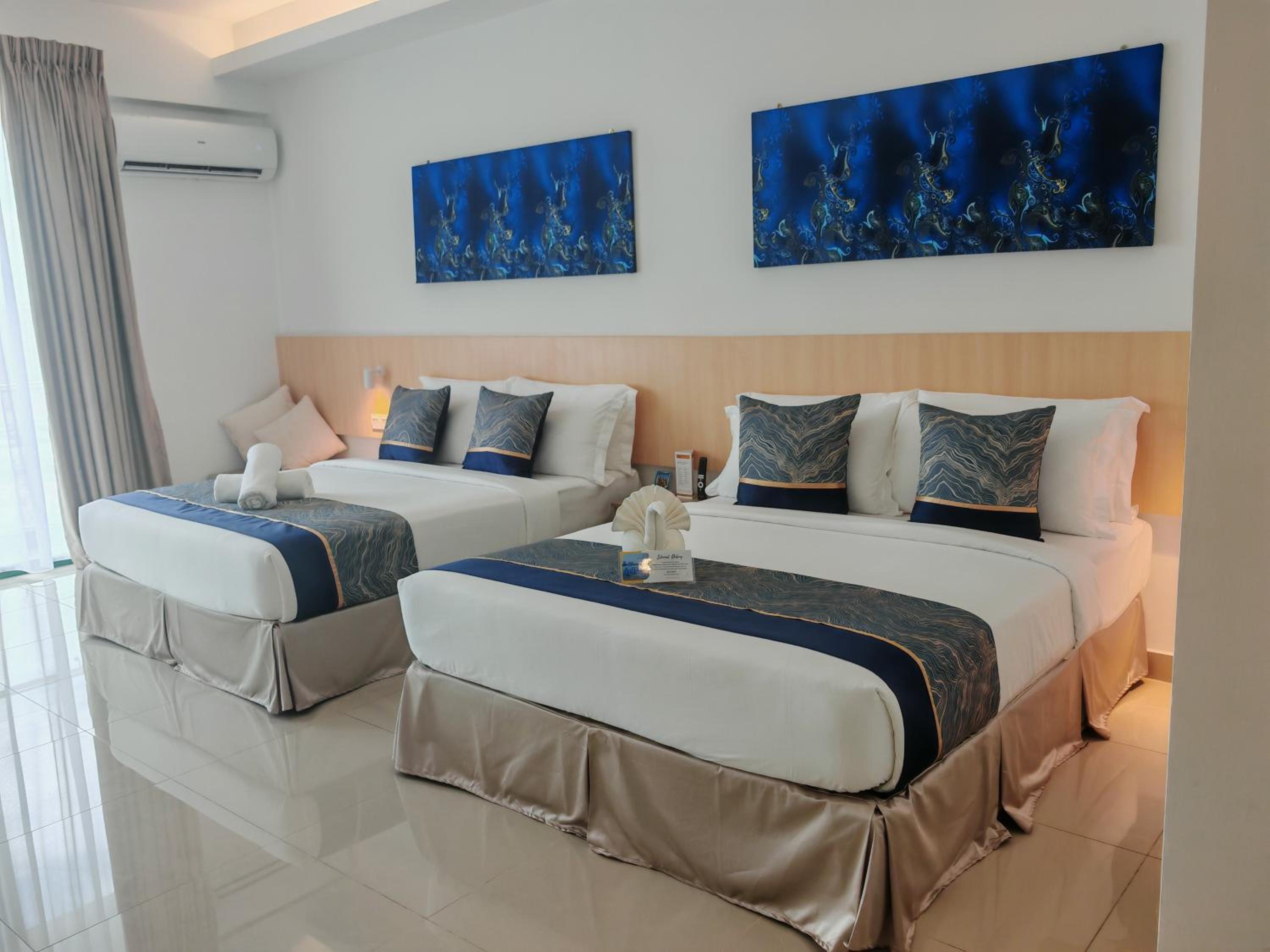 Double Deluxe Room - Photo 1