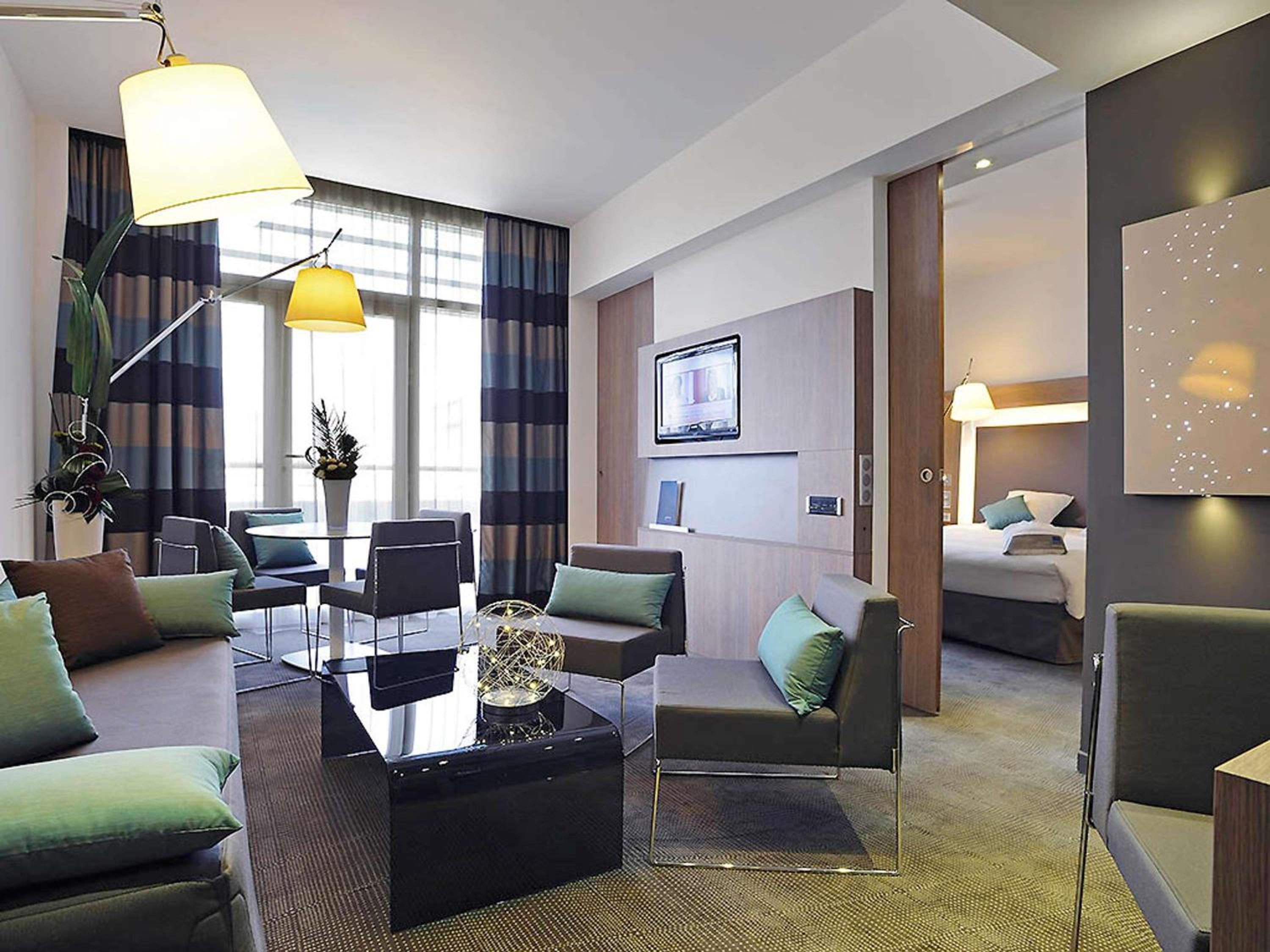 Executive Suite with One Double Bed and Two Single Beds