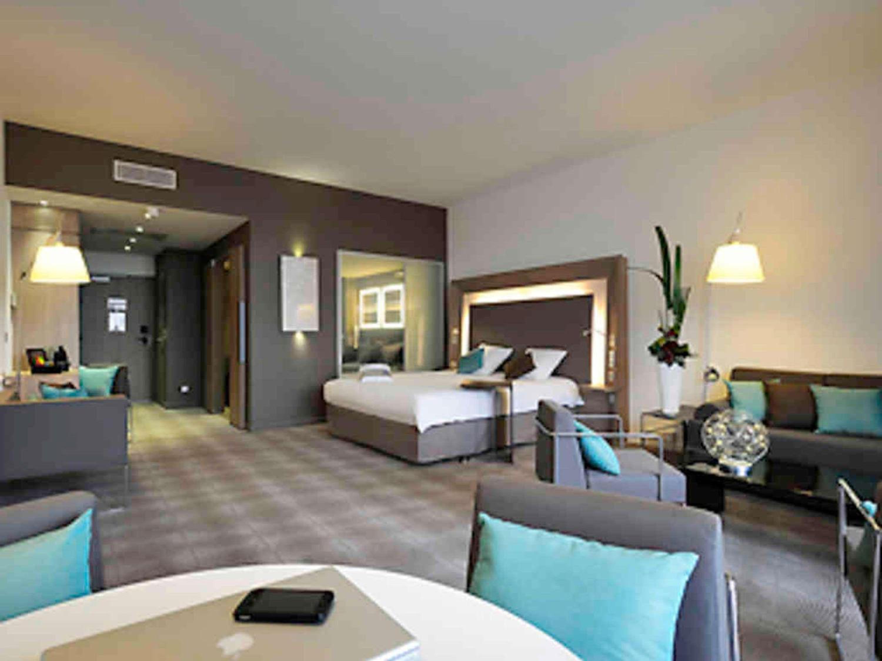 Standard Suite with One double bed and Two sofa beds