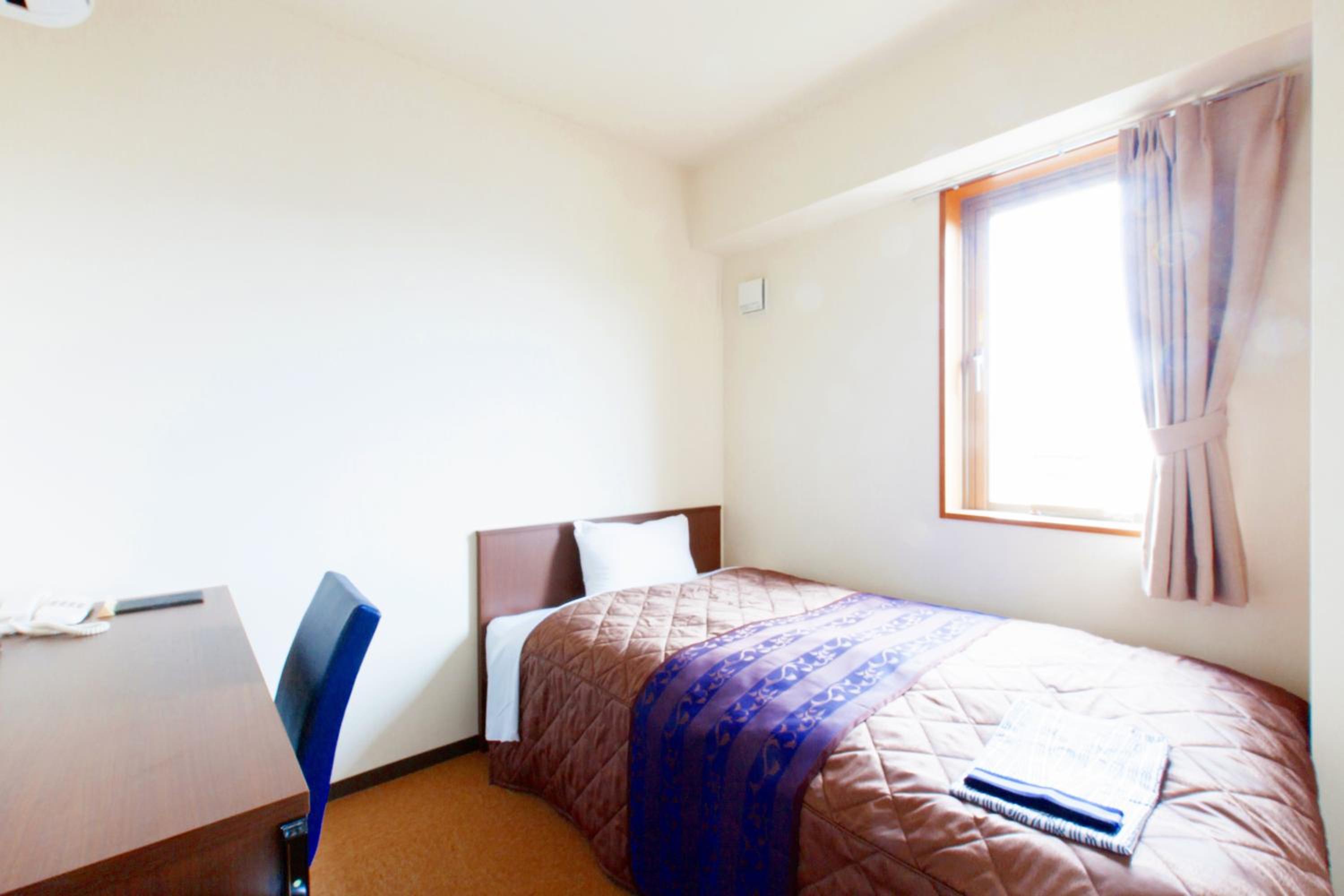 Single Room - New Building - Smoking - Photo 1