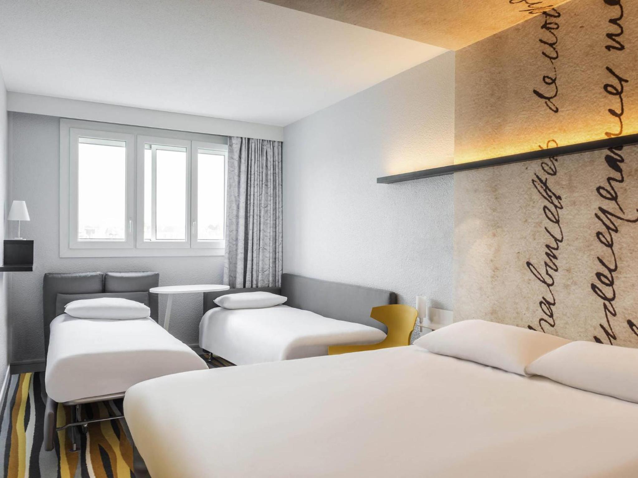Quadruple Room with One Double Bed and Sofa Bed
